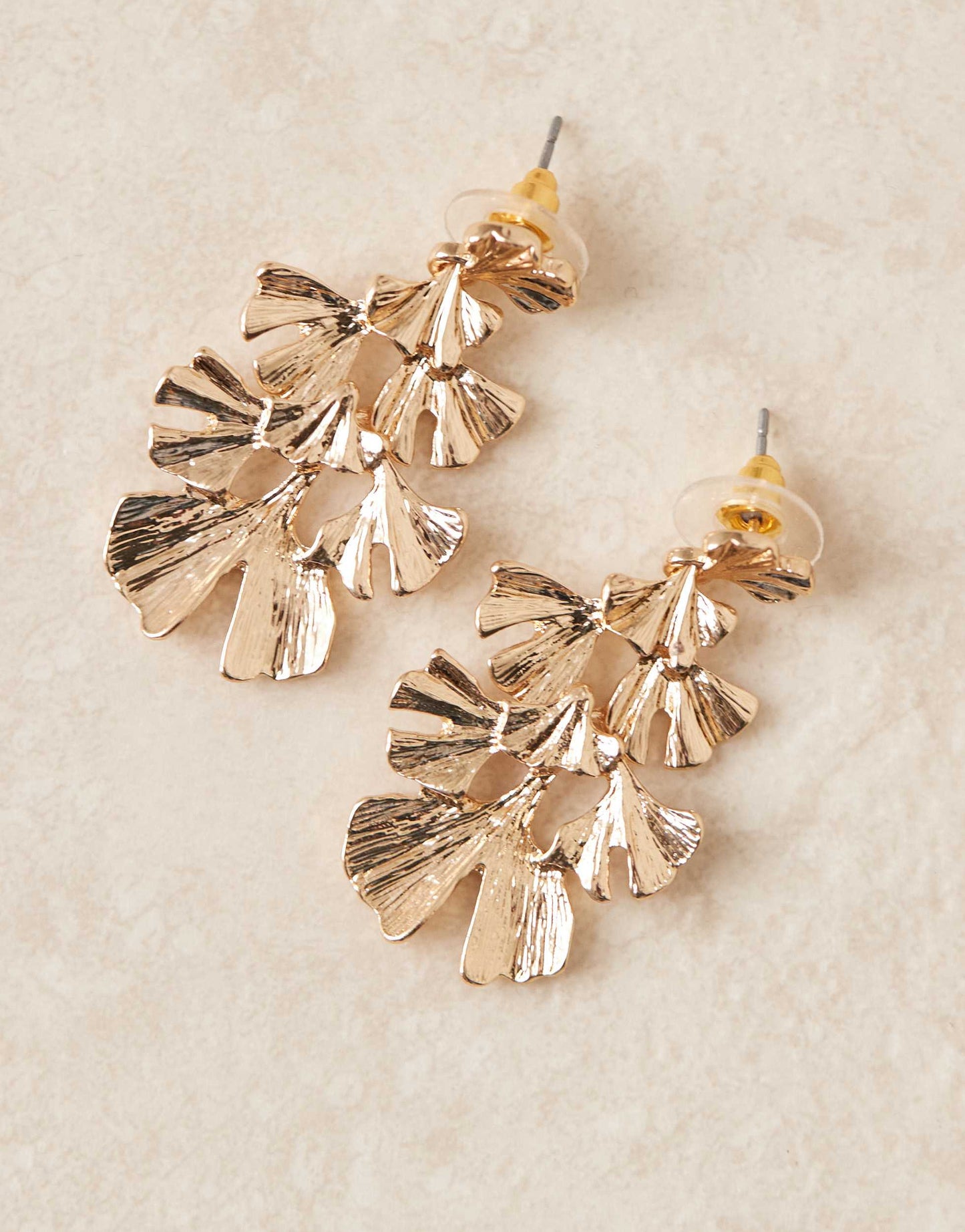 ASOS DESIGN drop earrings with multi petal detail in gold tone