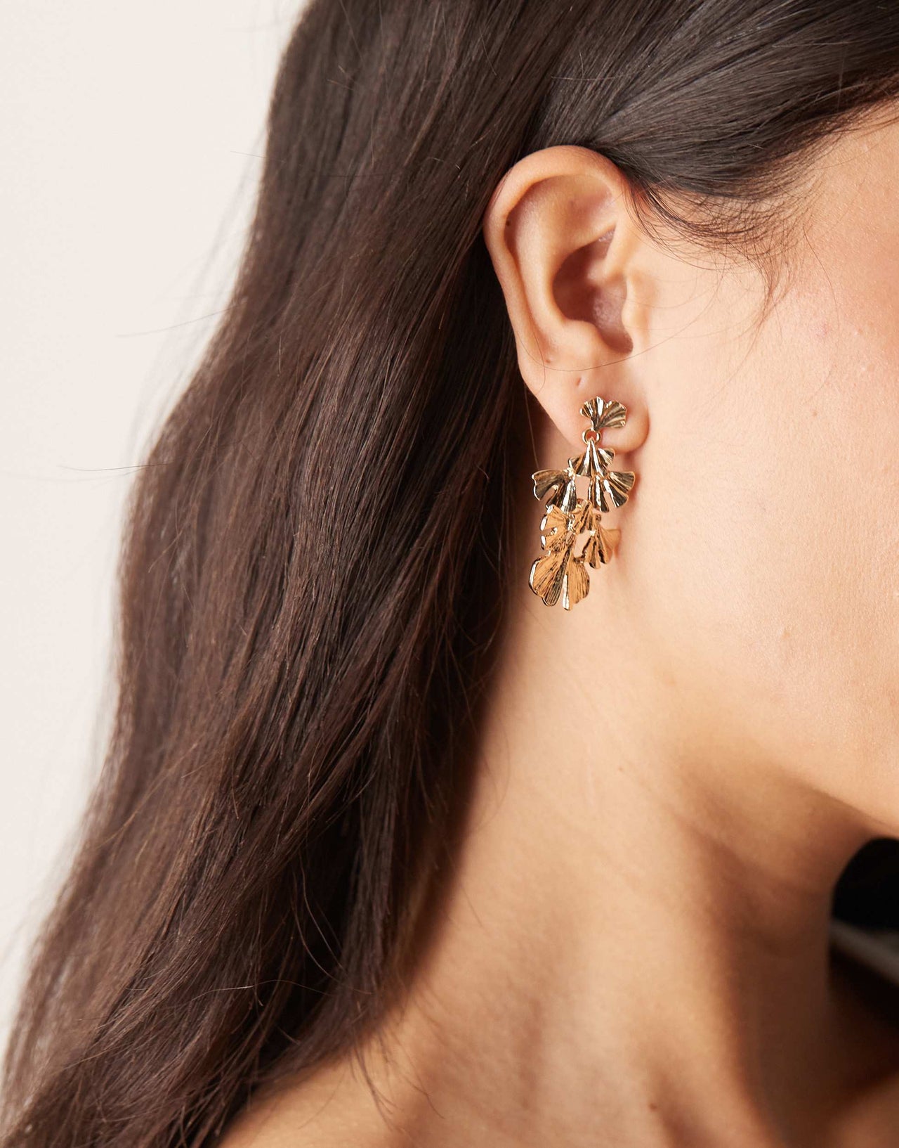 ASOS DESIGN drop earrings with multi petal detail in gold tone