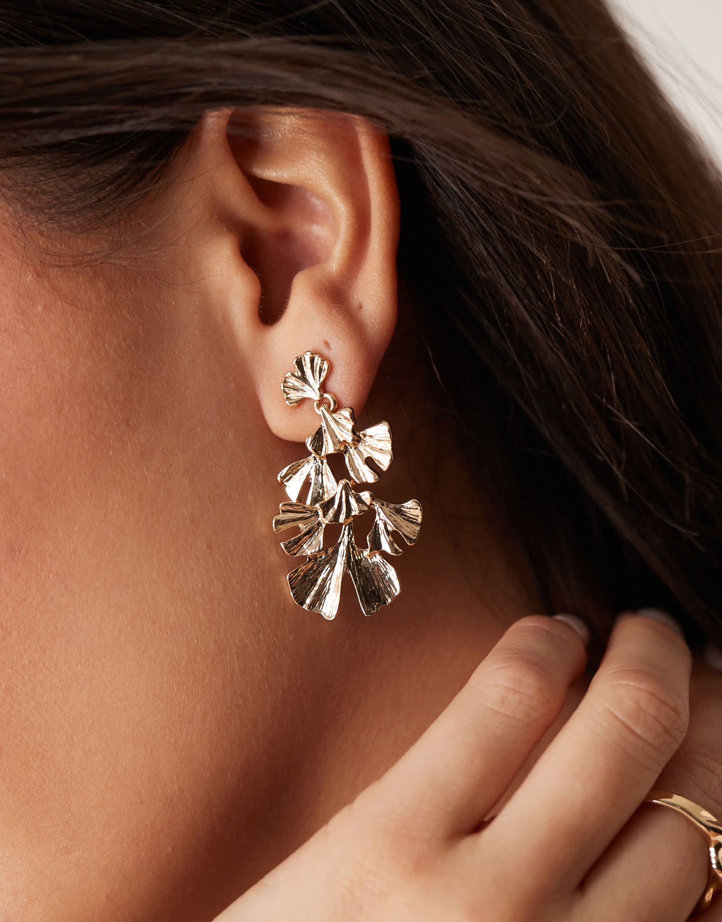 ASOS DESIGN drop earrings with multi petal detail in gold tone
