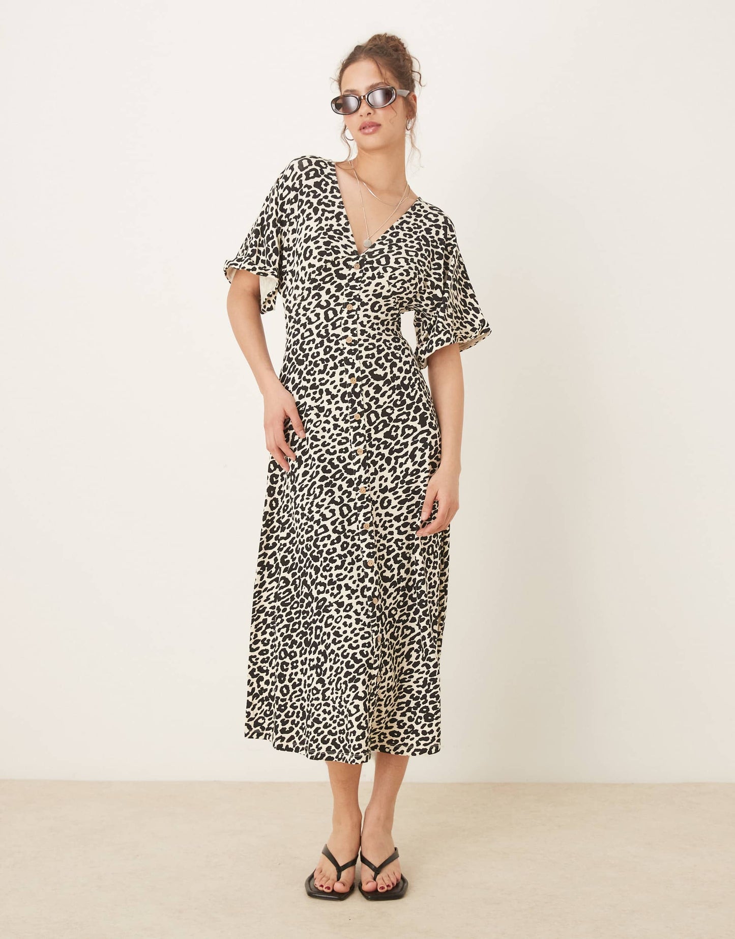 ASOS DESIGN roll sleeve button front midi tea dress in animal print