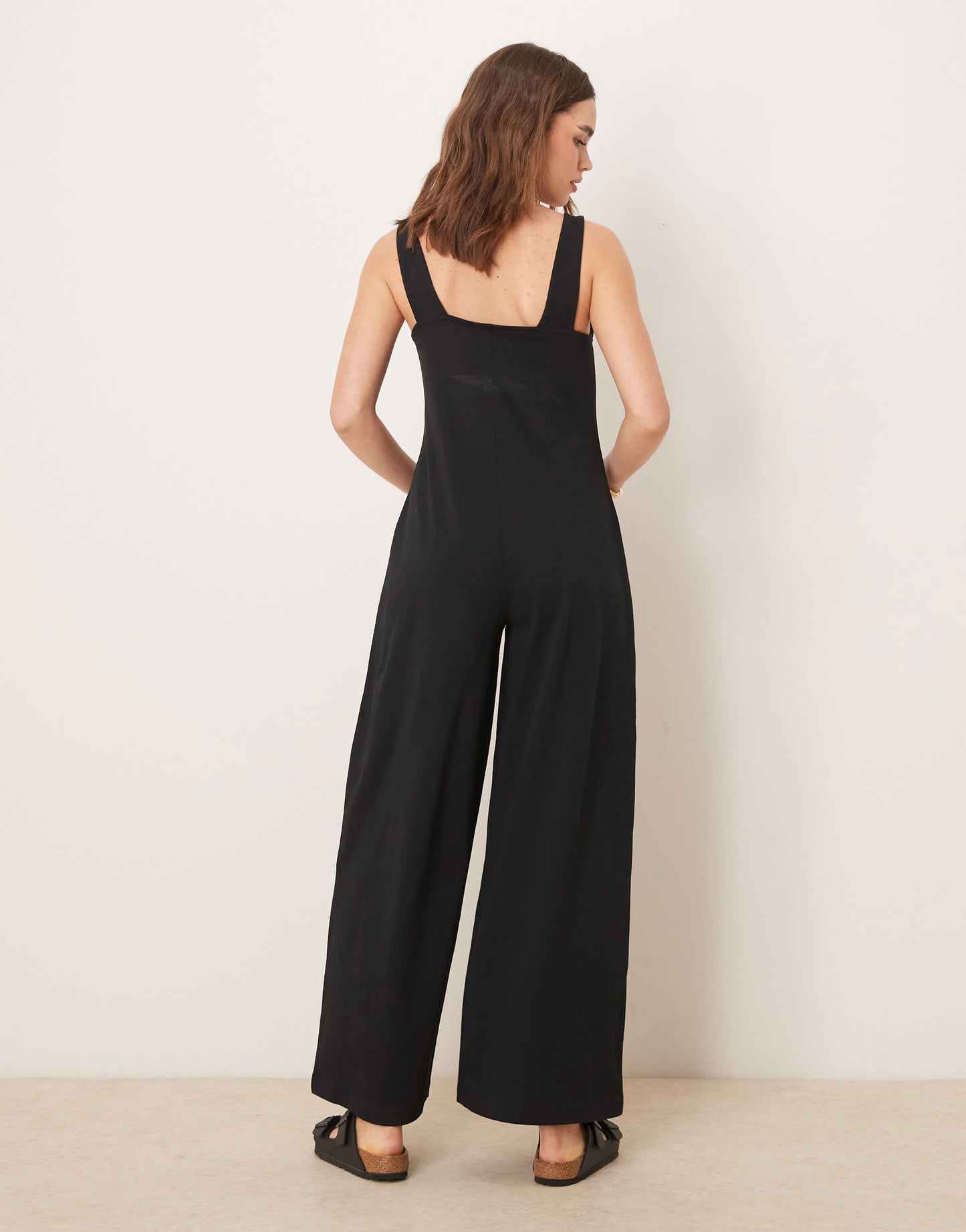 ASOS DESIGN button through jumpsuit in black