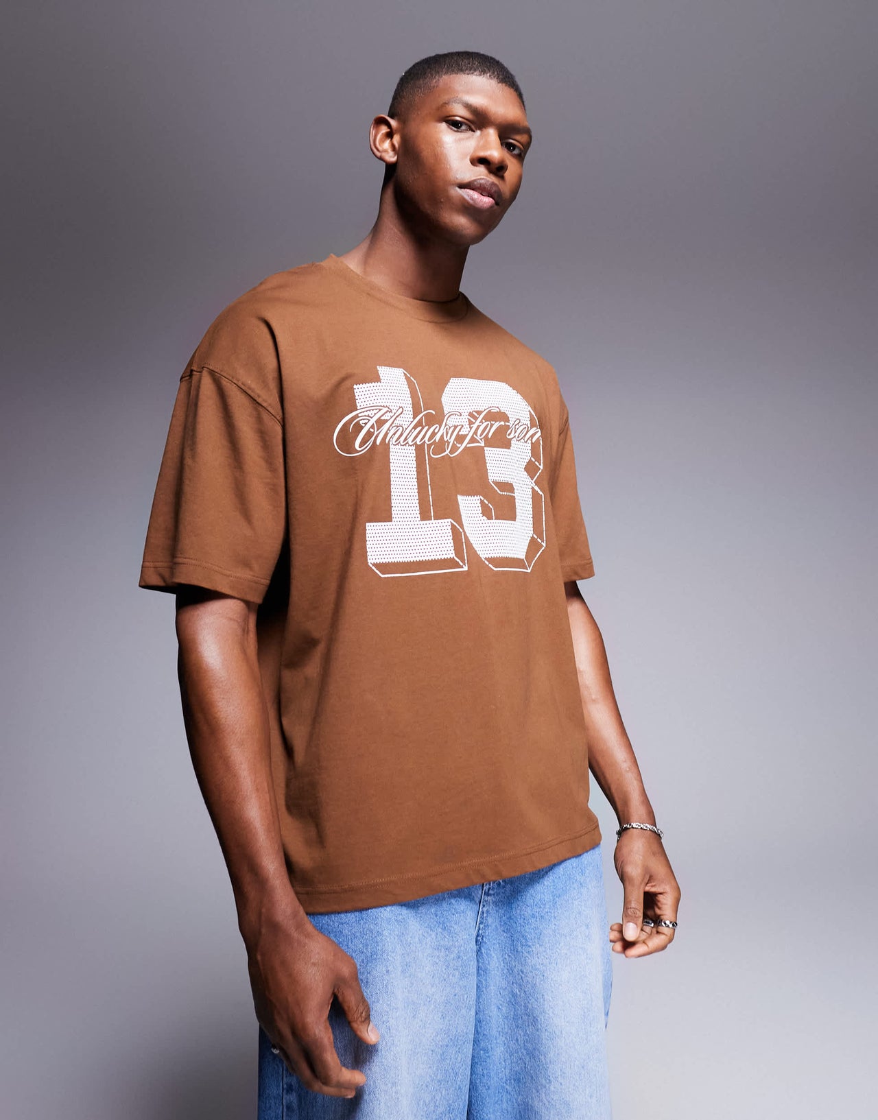 ASOS DESIGN oversized t-shirt with sports graphic in brown