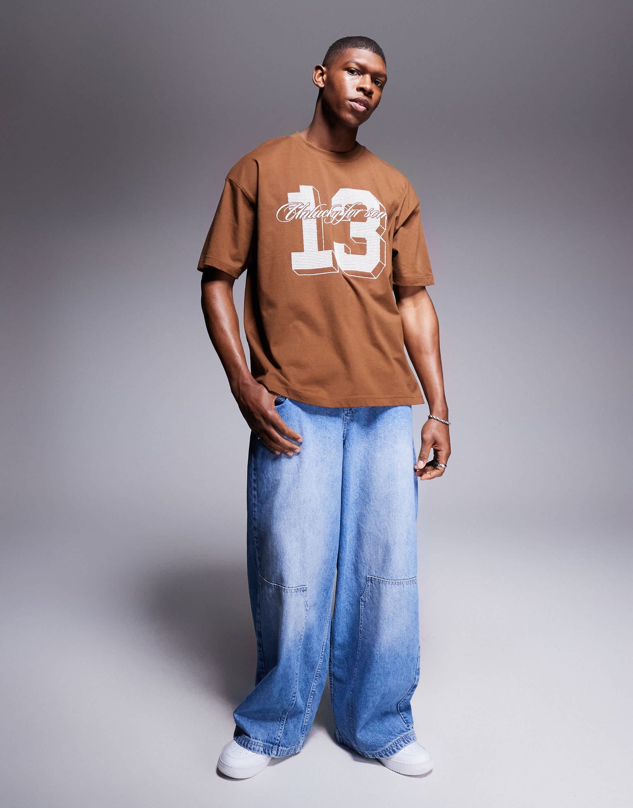 ASOS DESIGN oversized t-shirt with sports graphic in brown