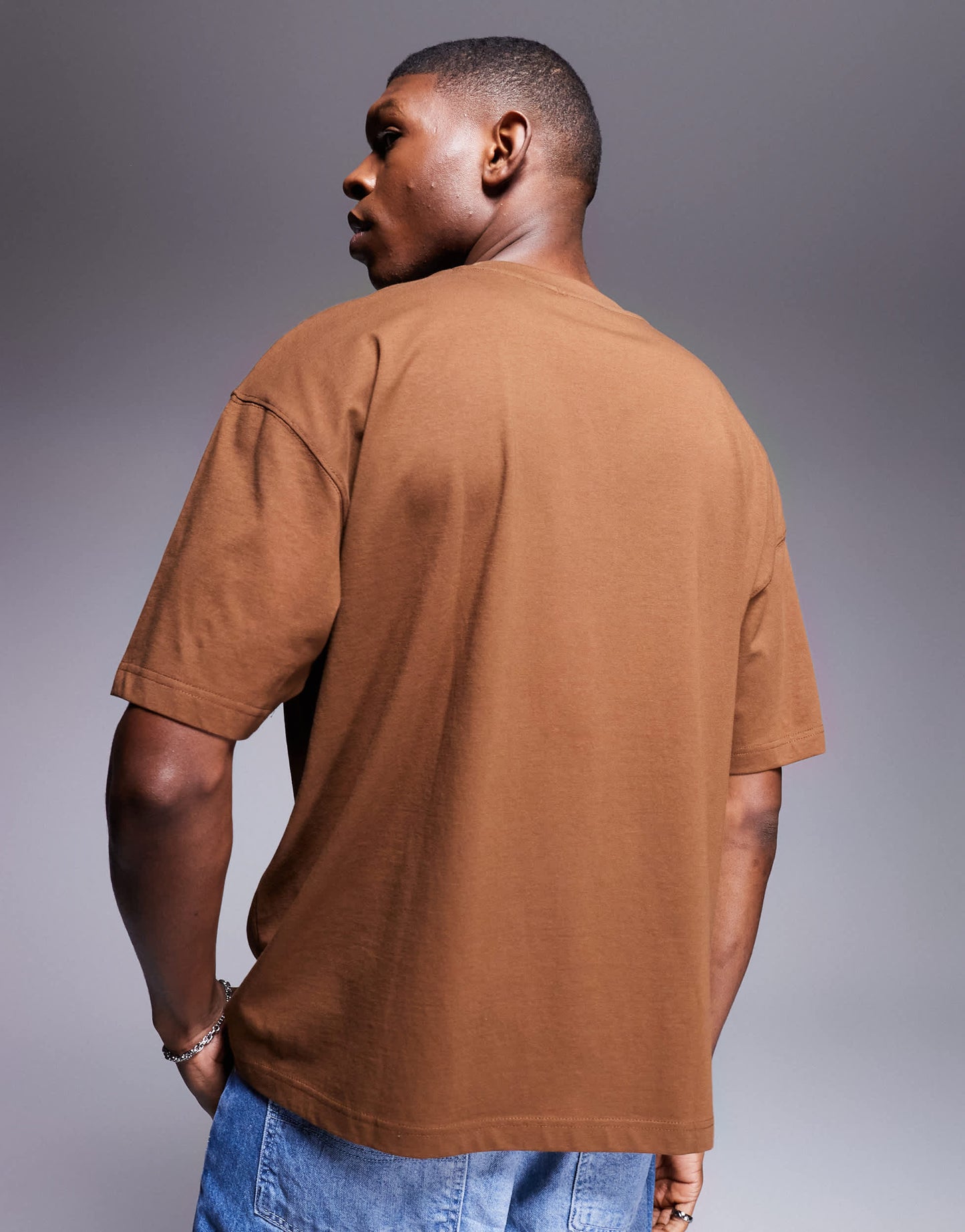 ASOS DESIGN oversized t-shirt with sports graphic in brown