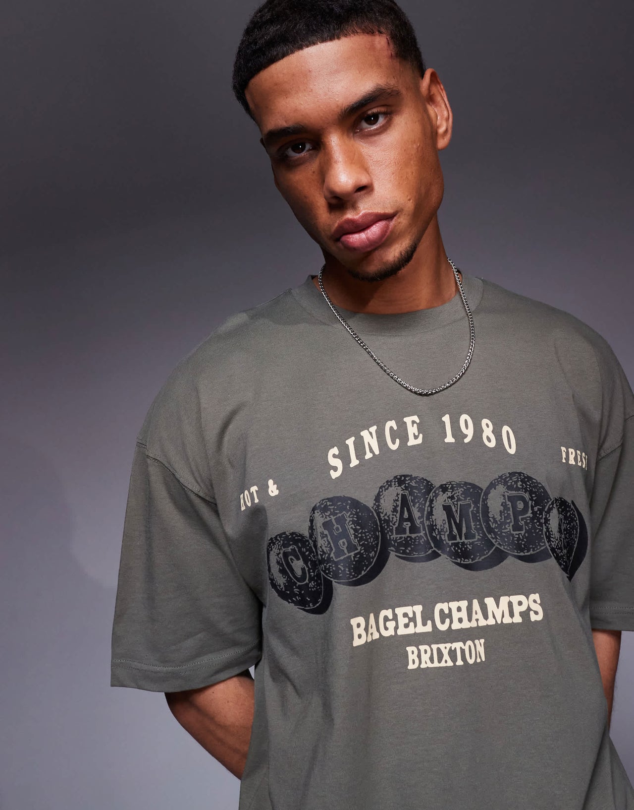 ASOS DESIGN oversized t-shirt with sports graphic in khaki