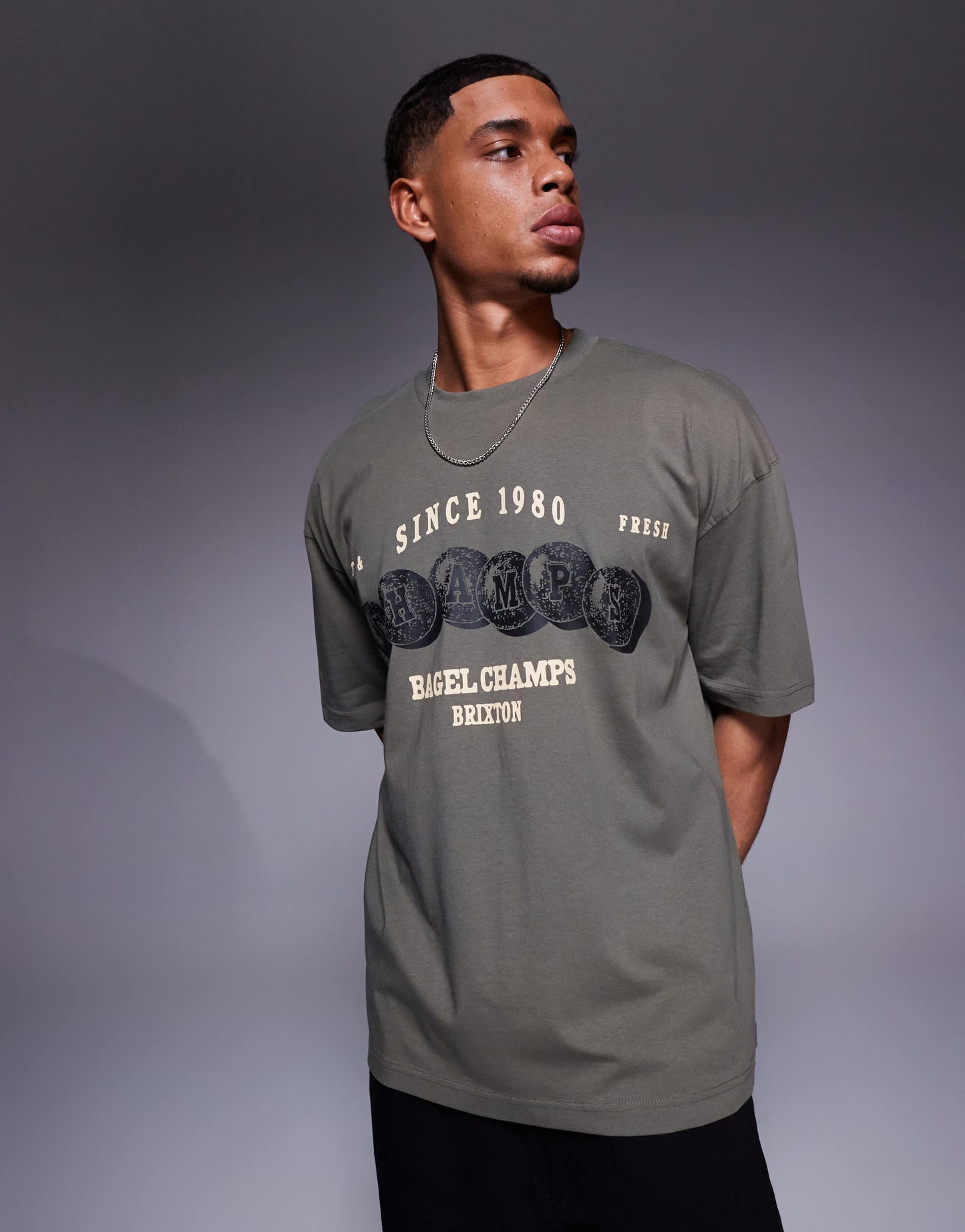 ASOS DESIGN oversized t-shirt with sports graphic in khaki