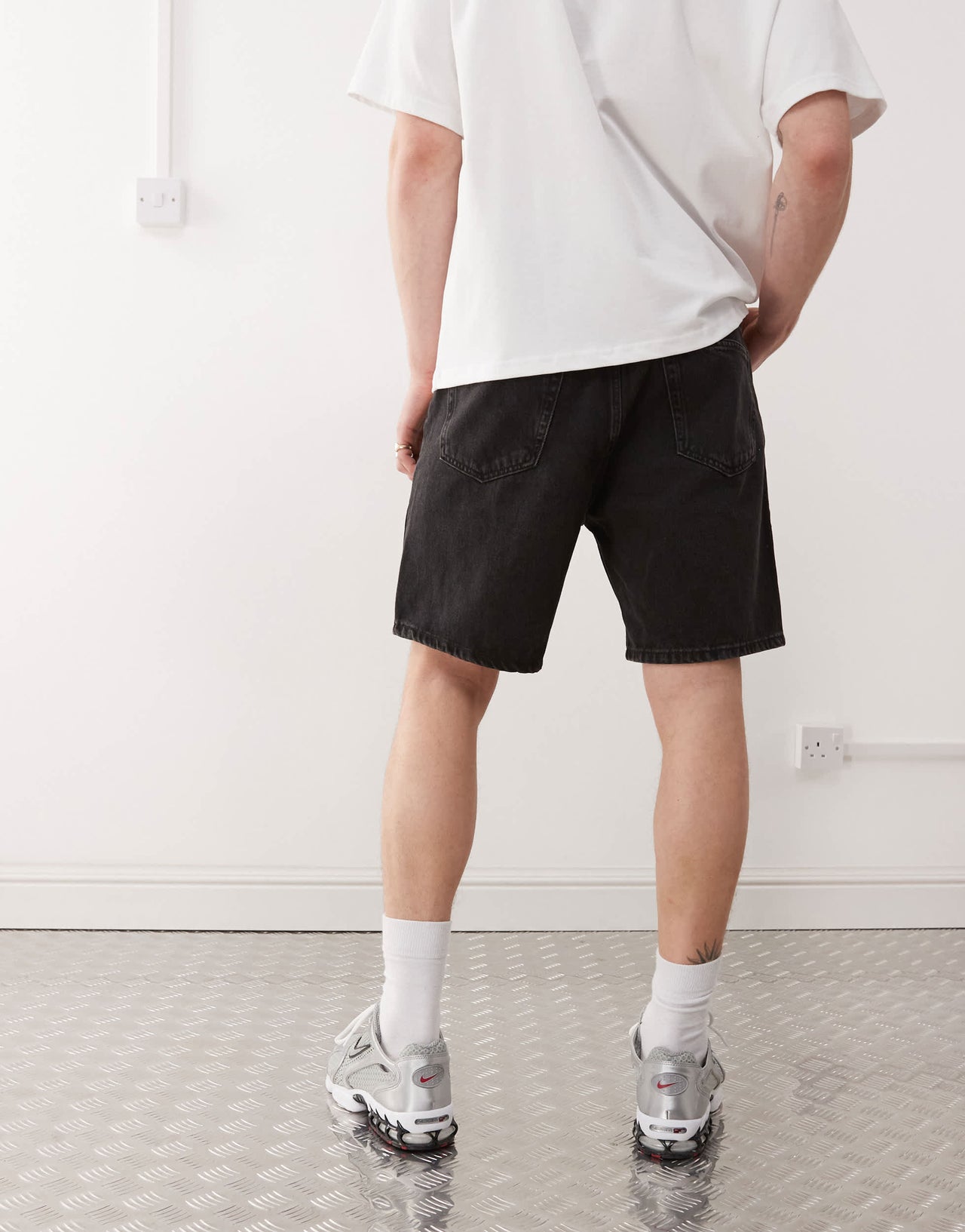 Weekday Space relaxed fit denim shorts in tuned black lux exclusive to ASOS