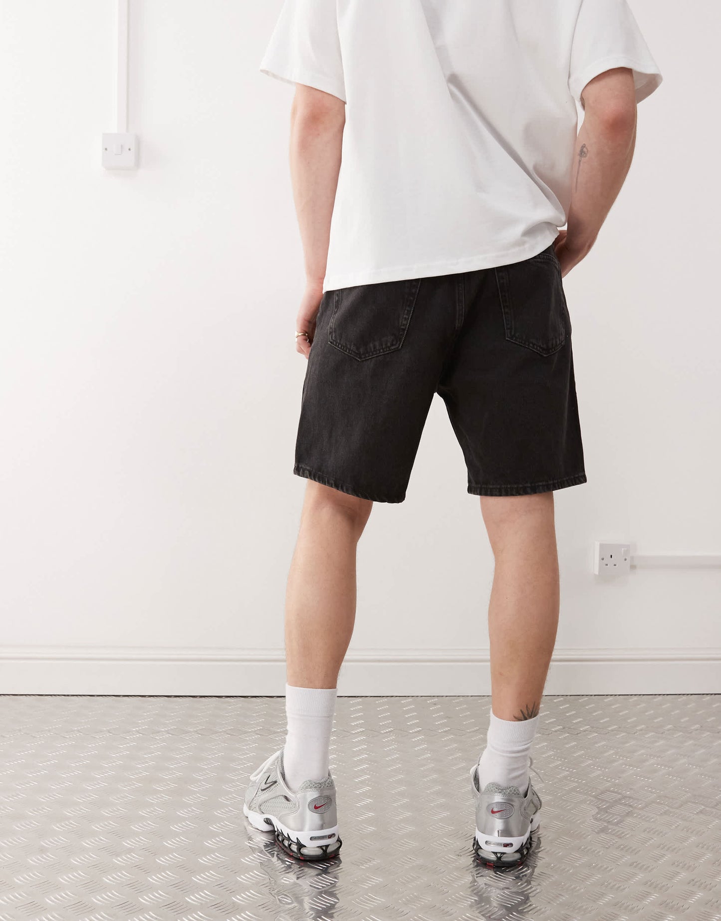 Weekday Space relaxed fit denim shorts in tuned black lux exclusive to ASOS