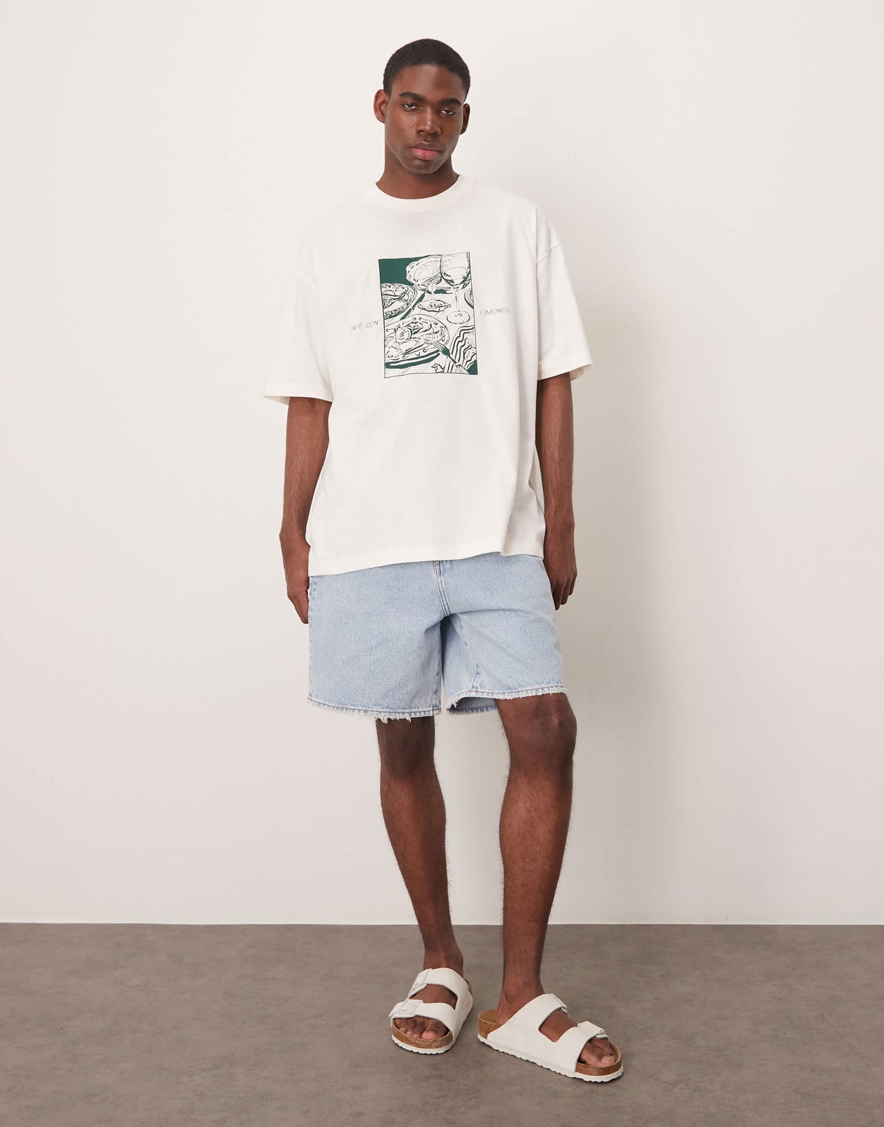 ASOS DESIGN oversized t-shirt with cafe graphic in cream