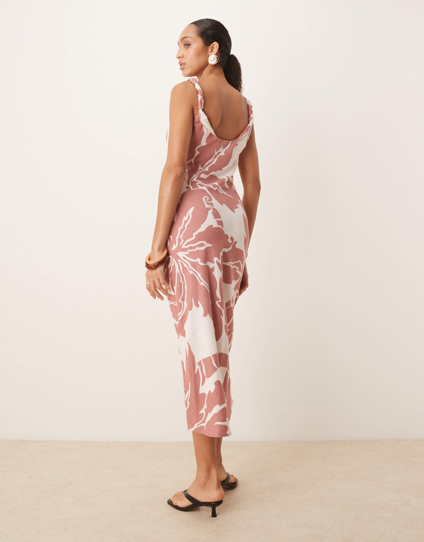 ASOS DESIGN linen look twist strap bias midi dress in blown out palm print