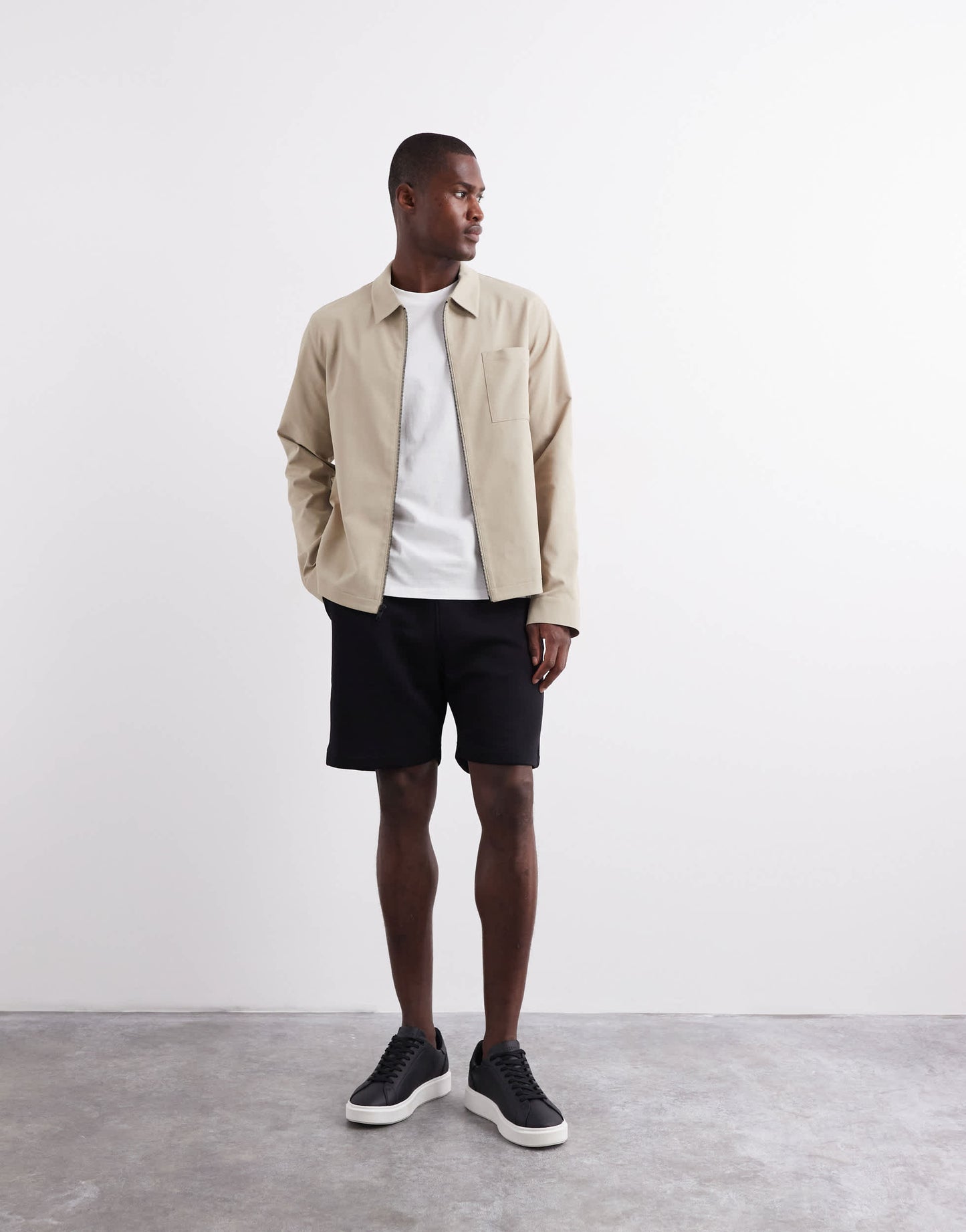 ASOS DESIGN essentials mid length slim shorts in black