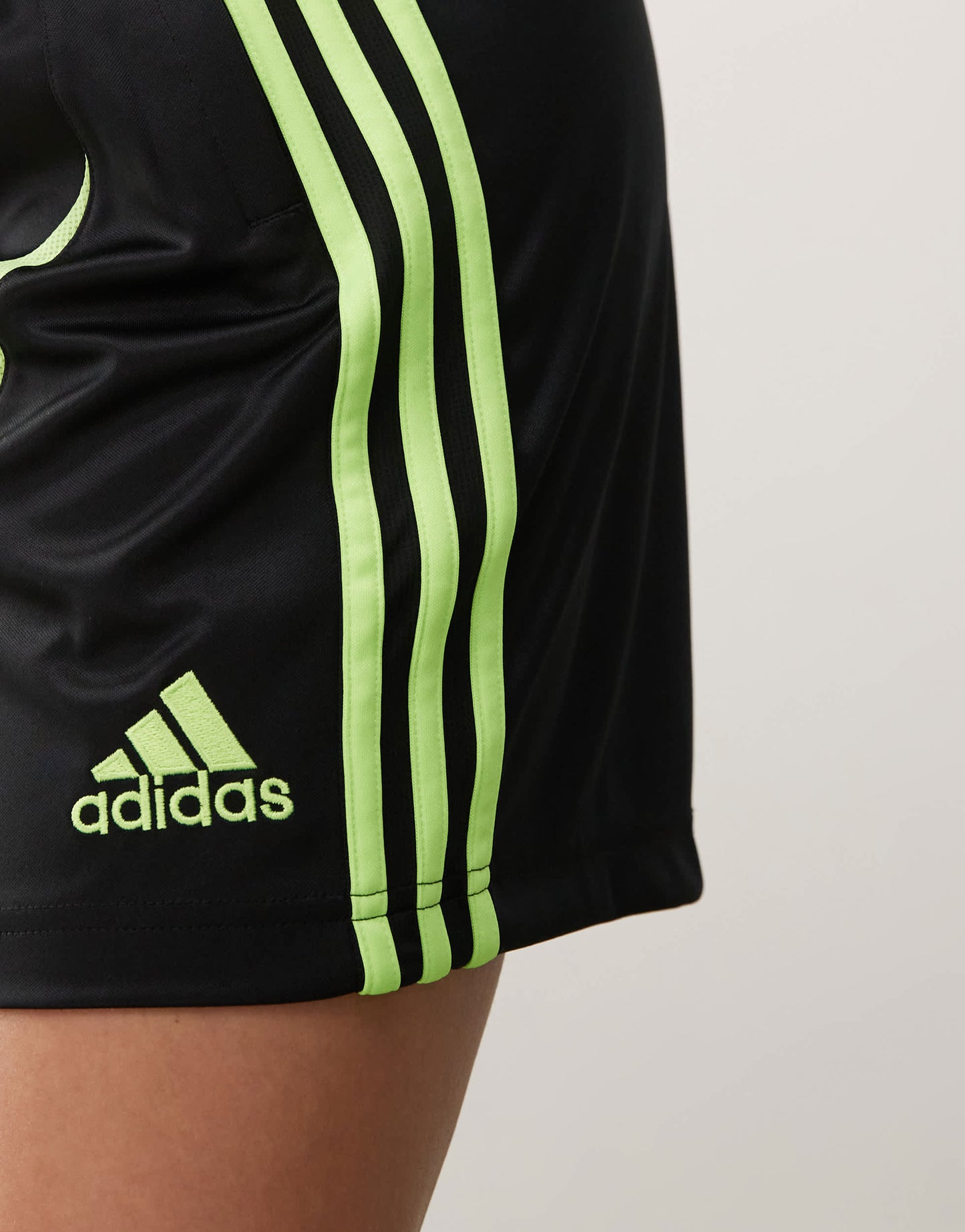 adidas Originals Teamgeist shorts in black and lime