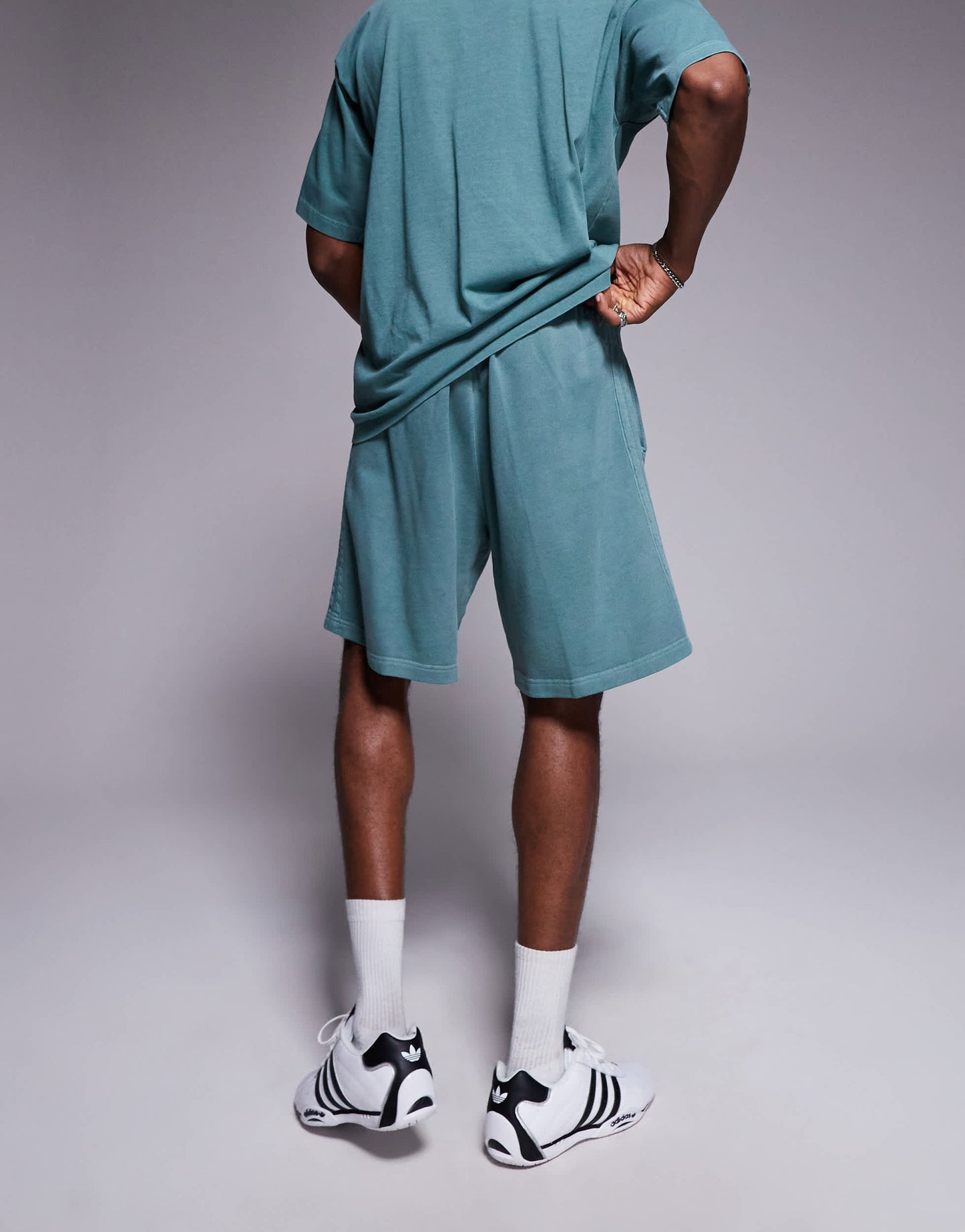 adidas Sportswear shorts in washed green