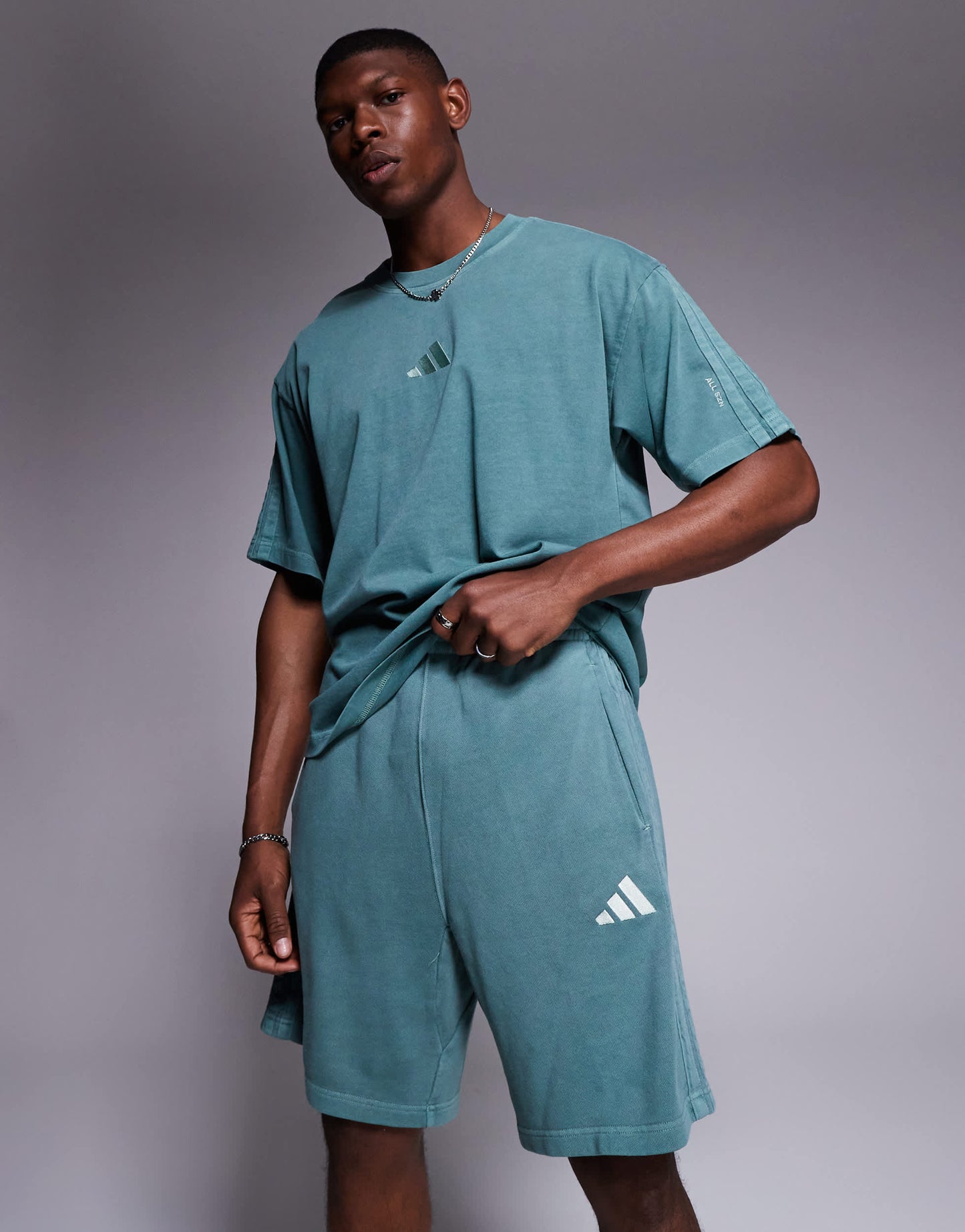 adidas Sportswear shorts in washed green