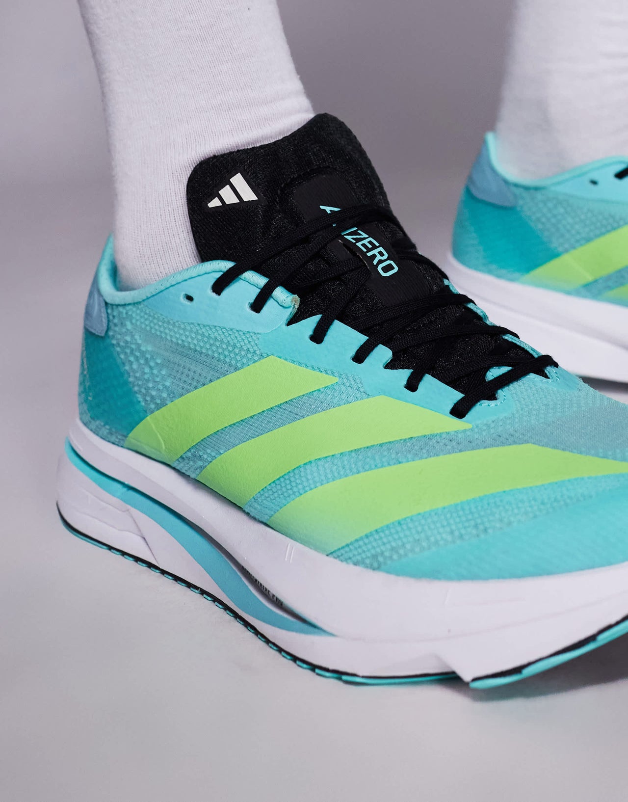 adidas Running Adizero SL2 trainers in blue and yellow