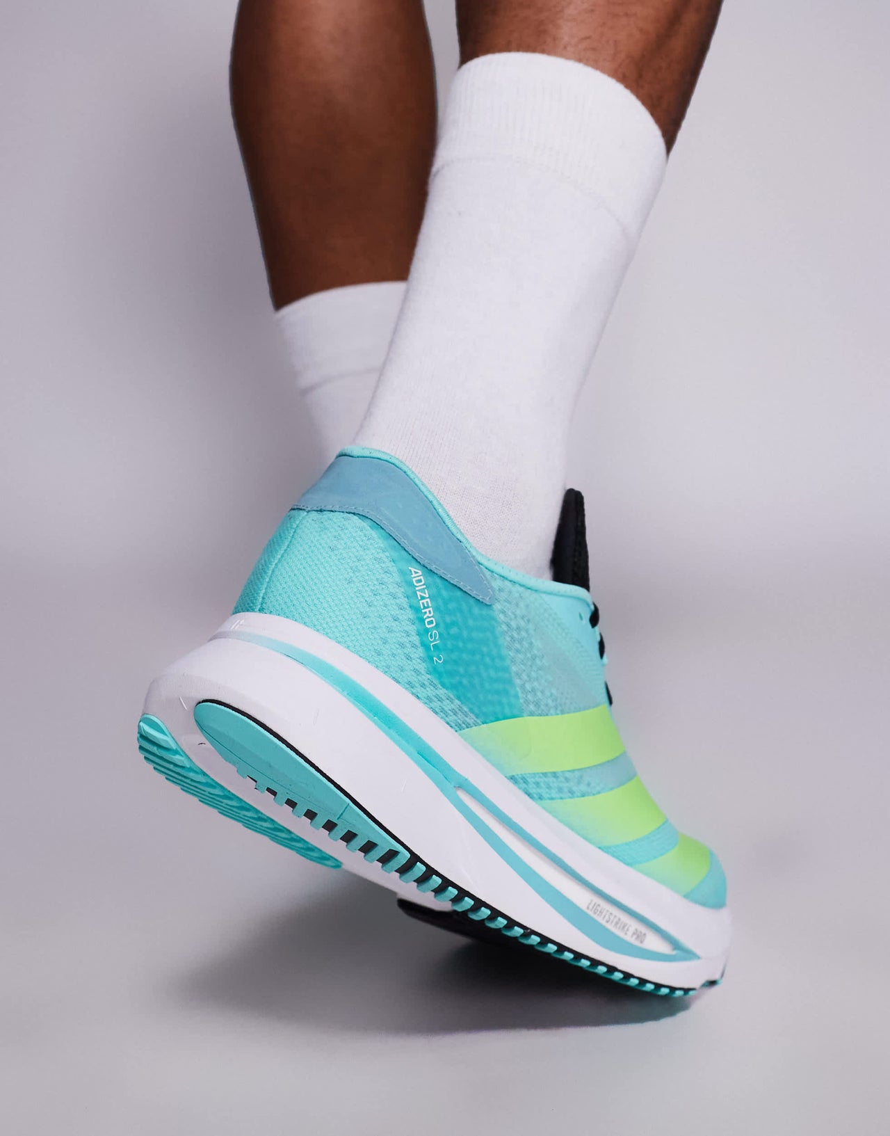 adidas Running Adizero SL2 trainers in blue and yellow