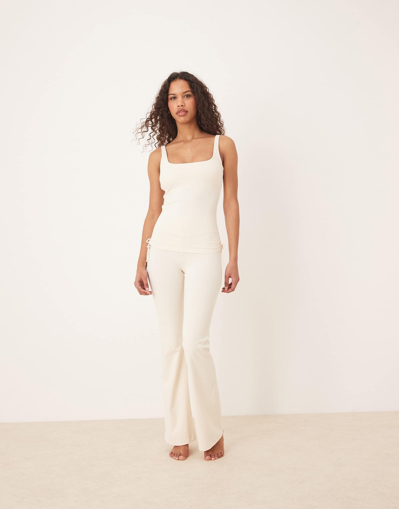 TALA DayFlex wrap high waisted flared yoga pant in cream
