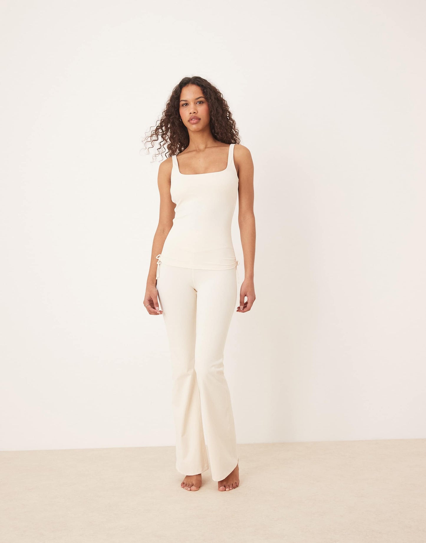 TALA DayFlex wrap high waisted flared yoga pant in cream