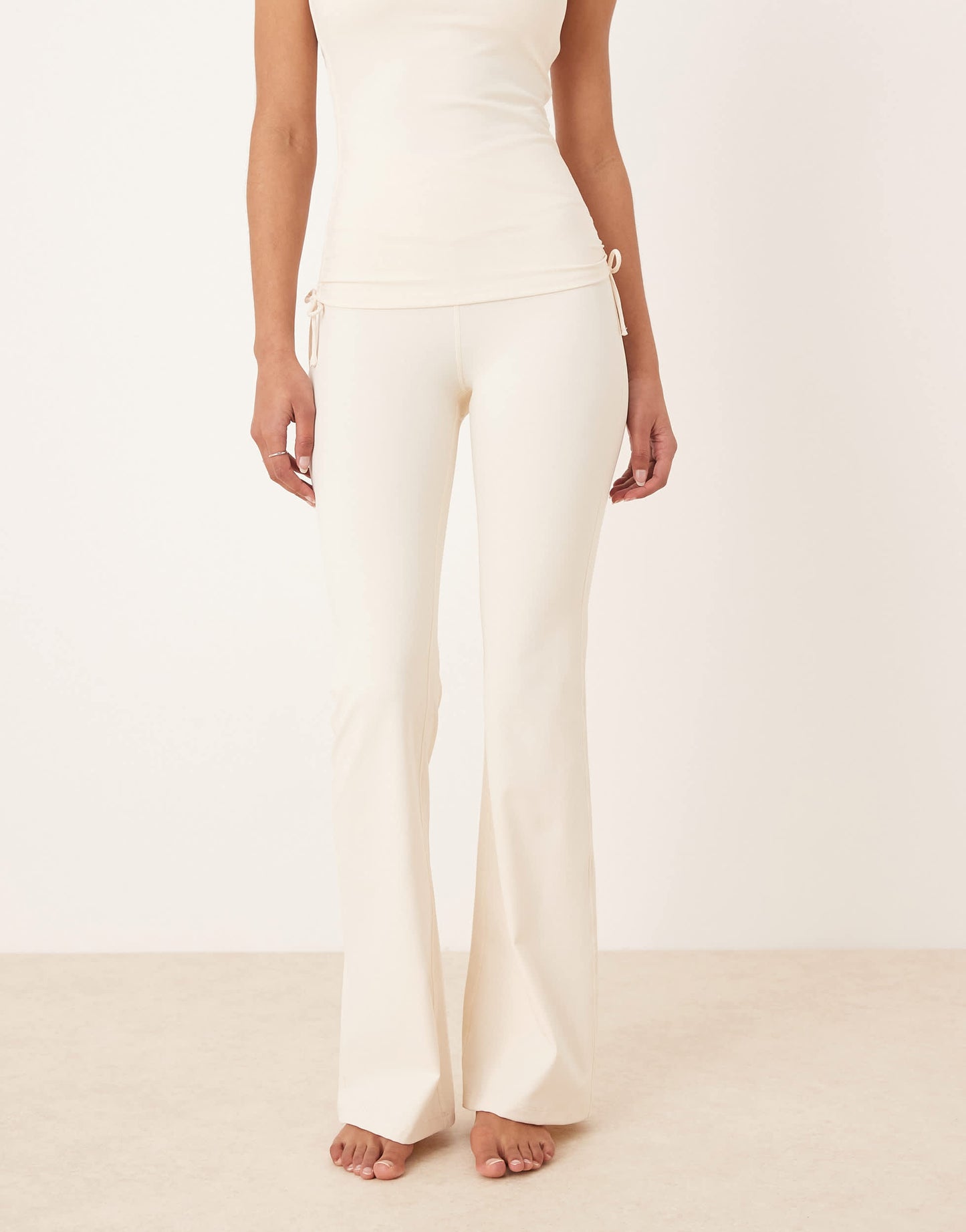 TALA DayFlex wrap high waisted flared yoga pant in cream