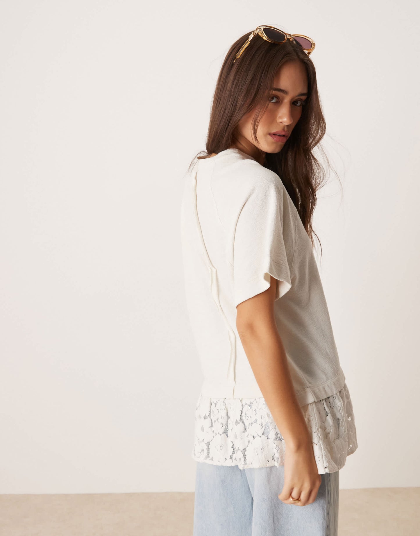 ASOS DESIGN oversized raglan t-shirt with lace hem detail in cream