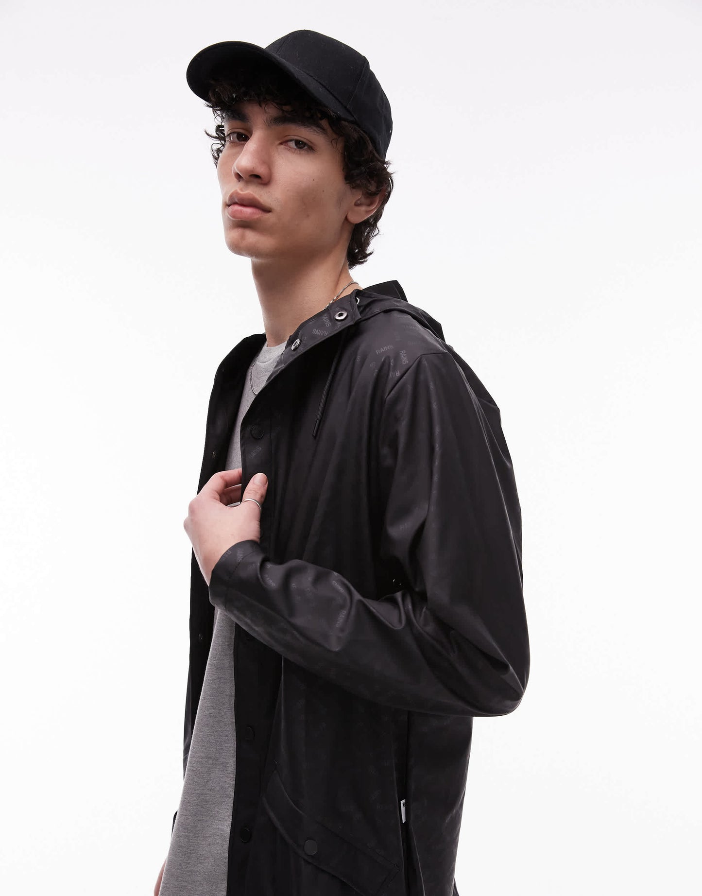 Rains 12010 waterproof short jacket with tonal logo in black