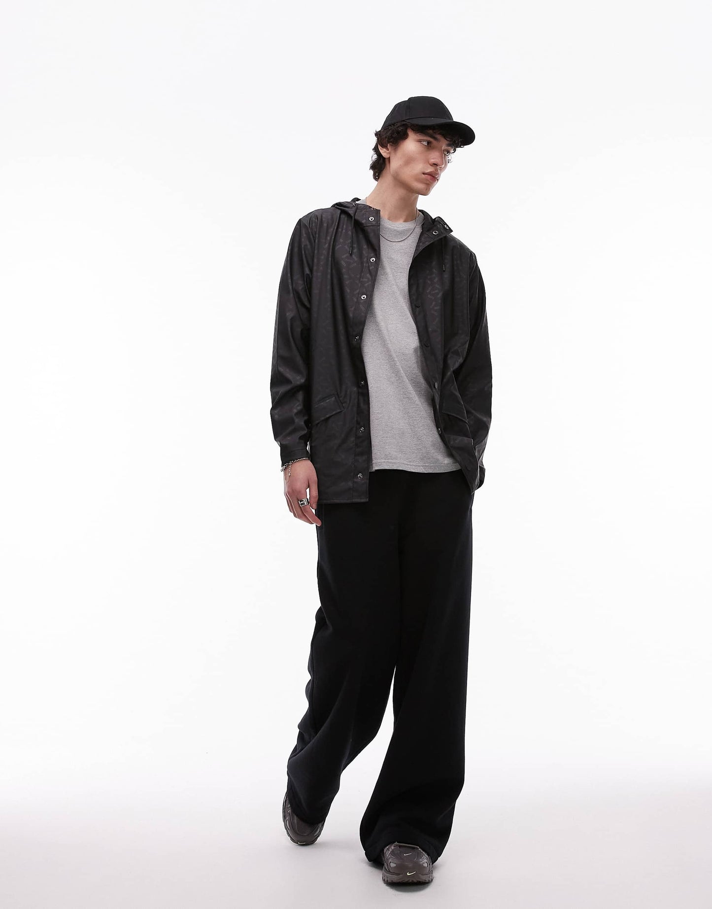 Rains 12010 waterproof short jacket with tonal logo in black
