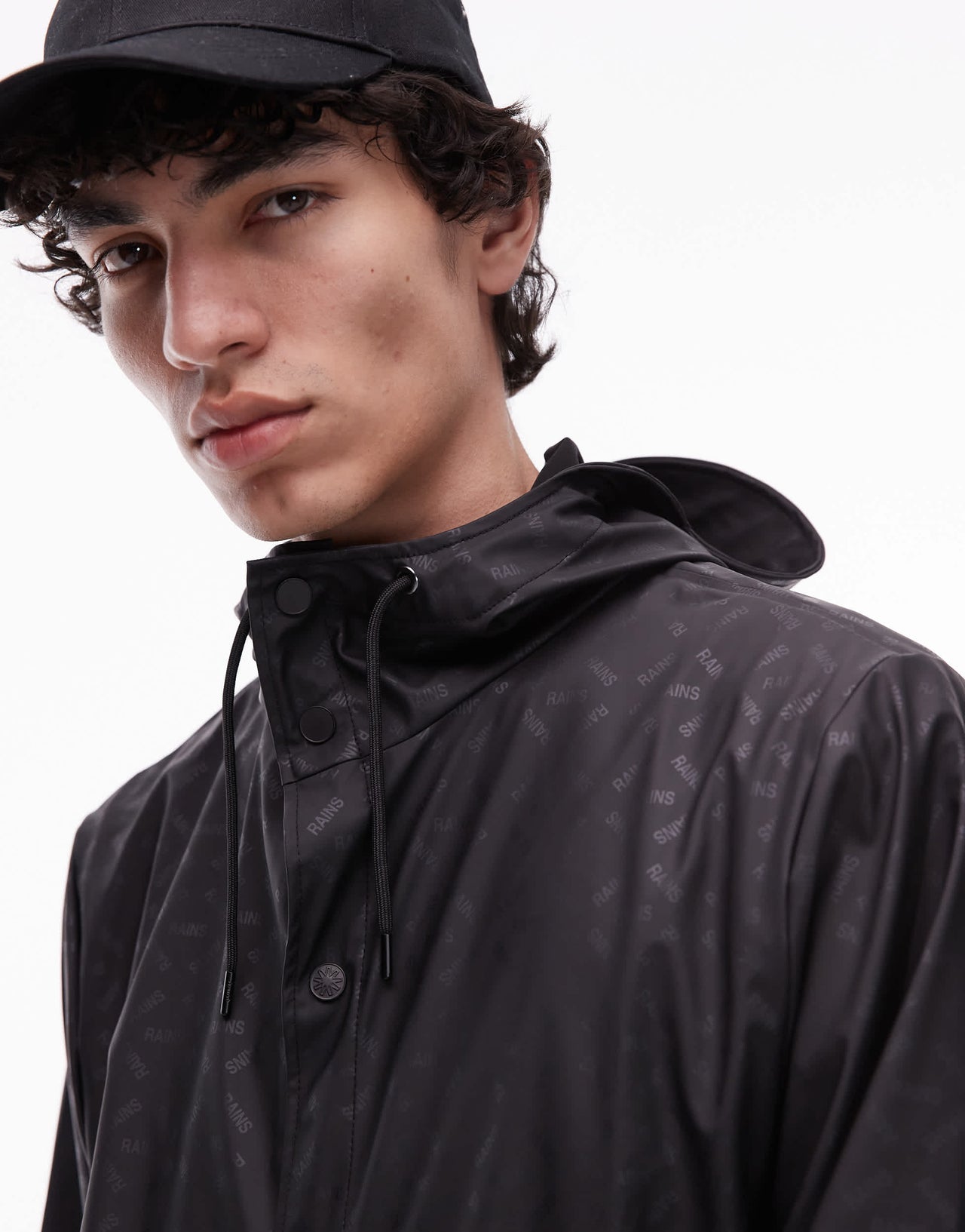 Rains 12010 waterproof short jacket with tonal logo in black