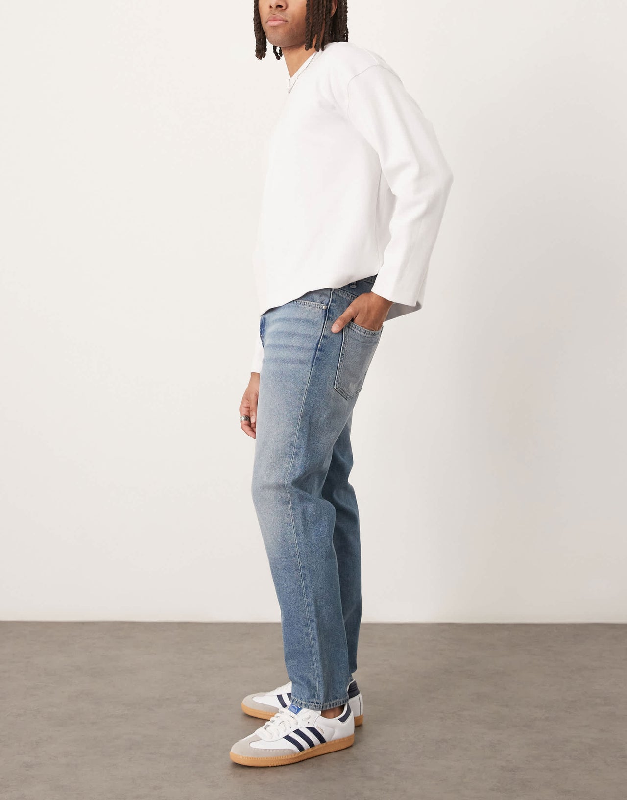 ASOS DESIGN tapered jeans in light wash blue