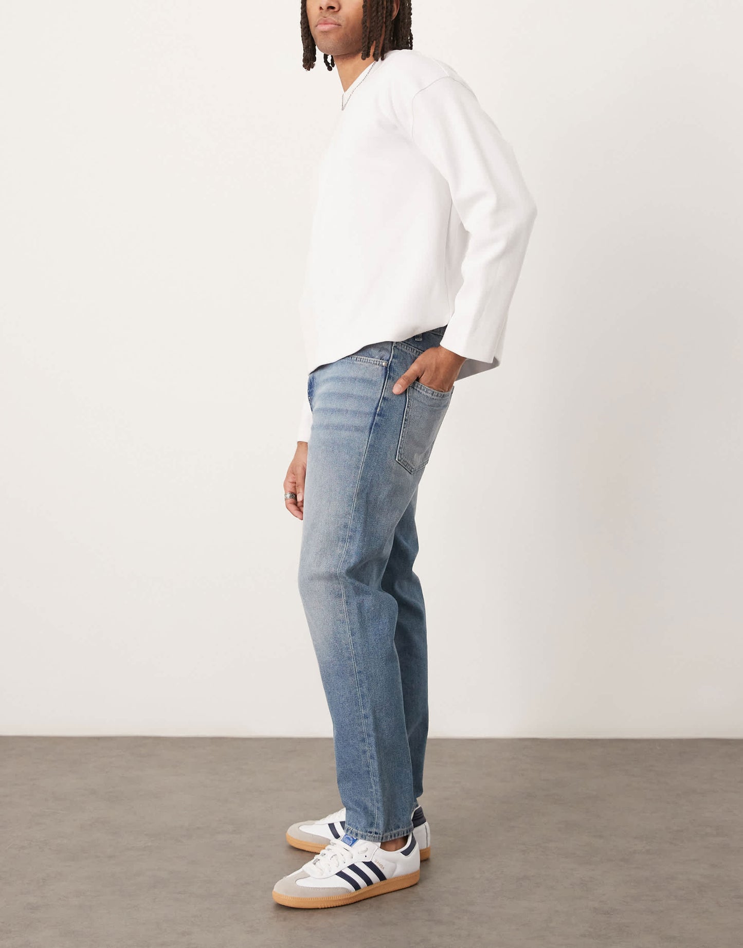 ASOS DESIGN tapered jeans in light wash blue