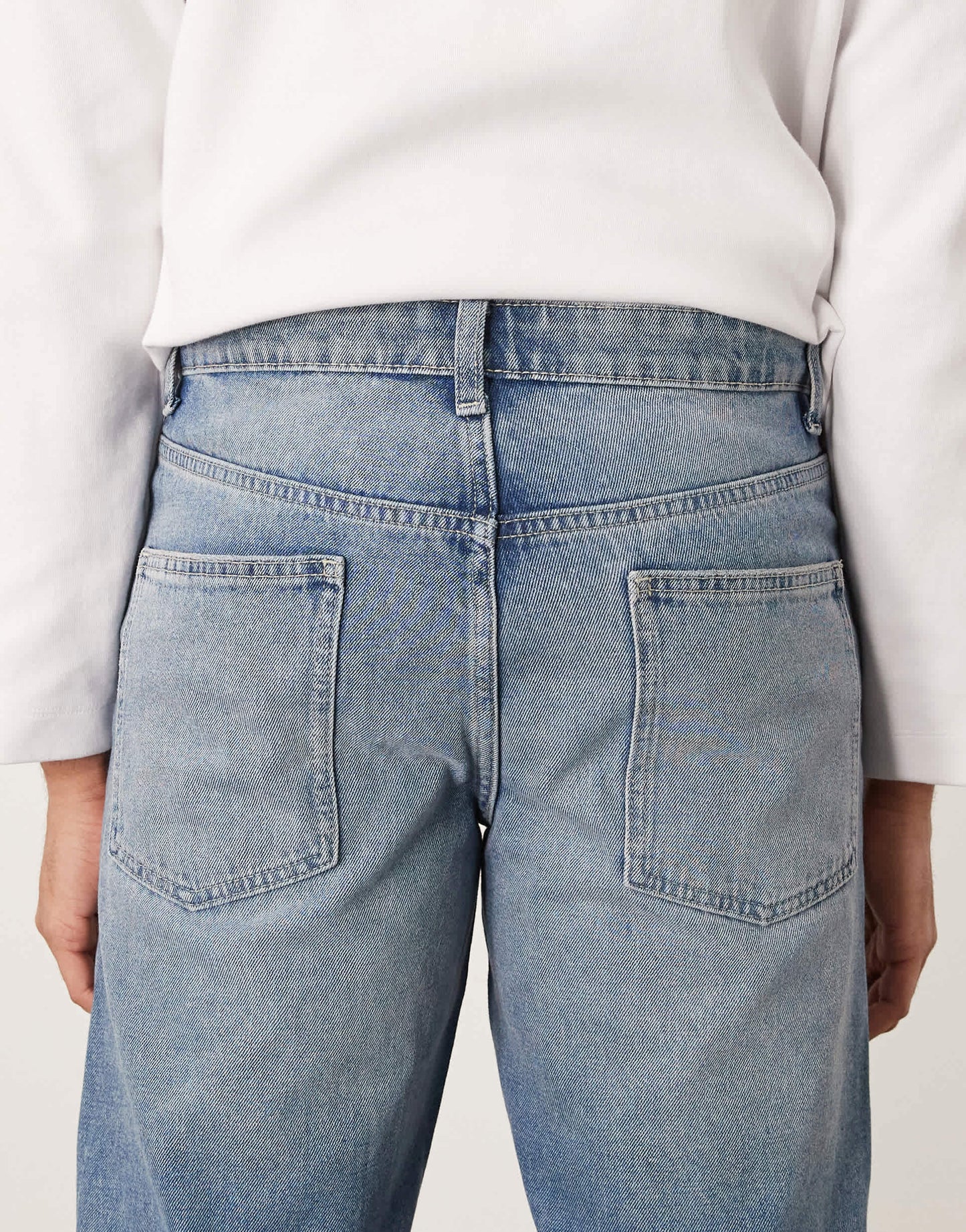 ASOS DESIGN tapered jeans in light wash blue