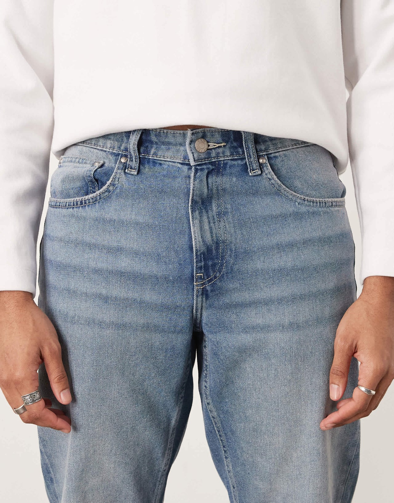 ASOS DESIGN tapered jeans in light wash blue