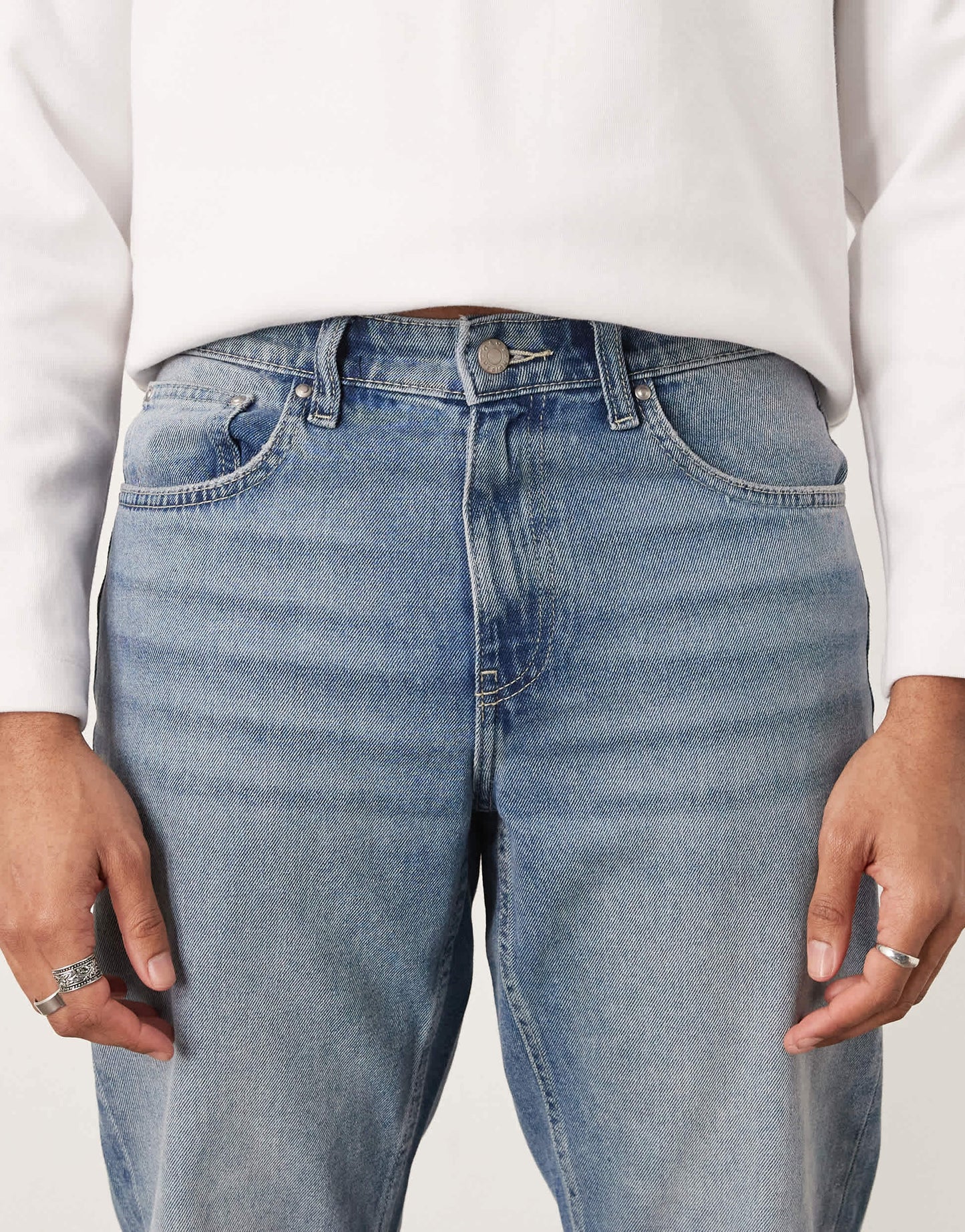 ASOS DESIGN tapered jeans in light wash blue