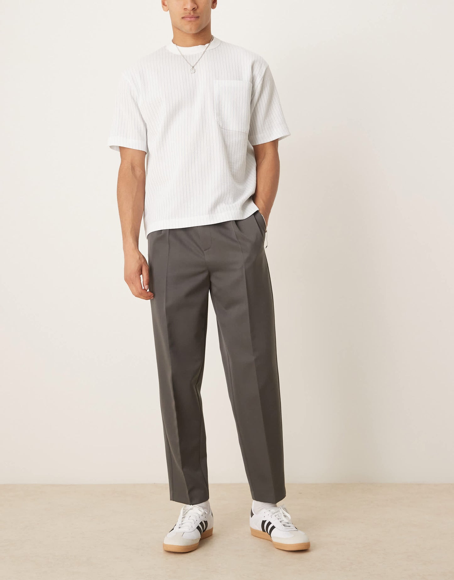 ASOS DESIGN smart relaxed tapered trousers with front pleat in charcoal