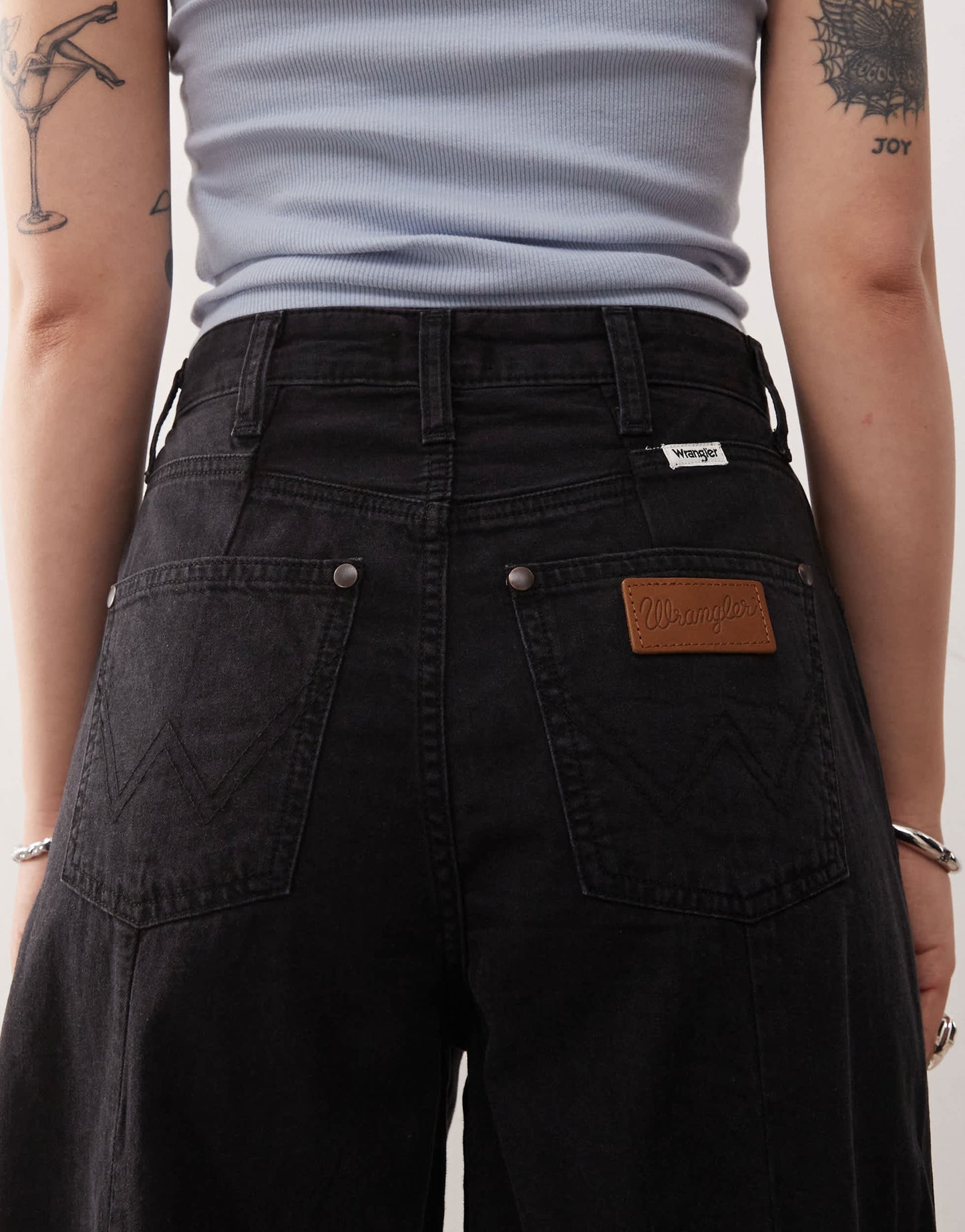 Wrangler lightweight wide leg cowboy fit jean in black with front seams