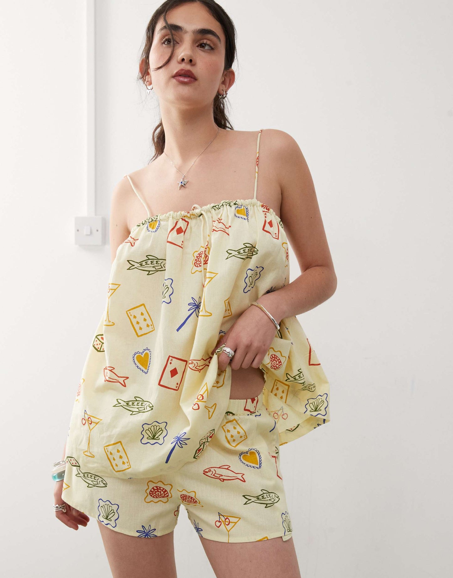 Reclaimed Vintage pull on relaxed beach short in yellow postcard print