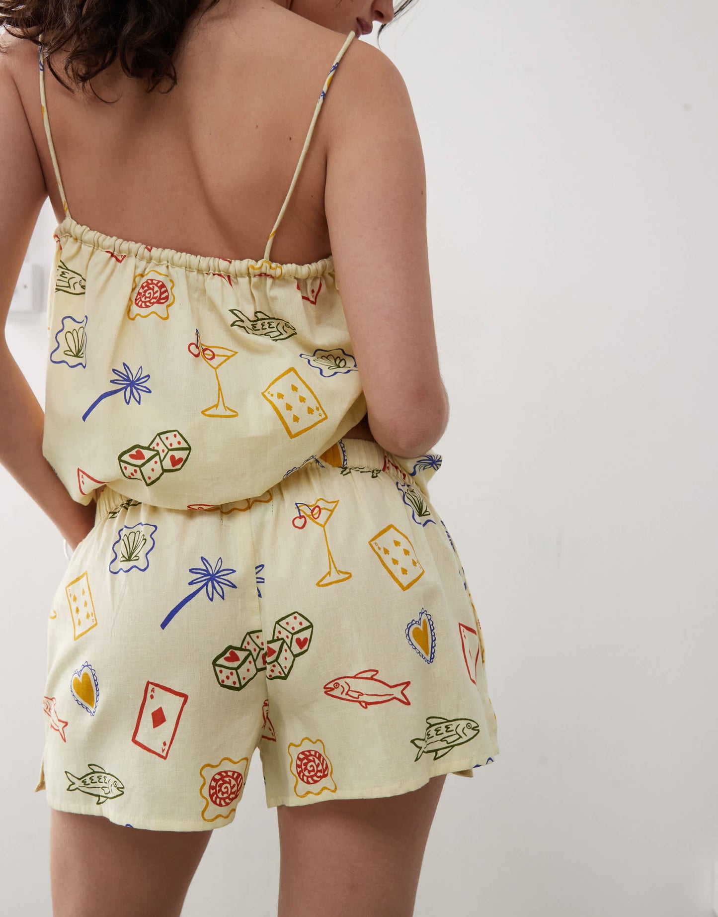 Reclaimed Vintage pull on relaxed beach short in yellow postcard print