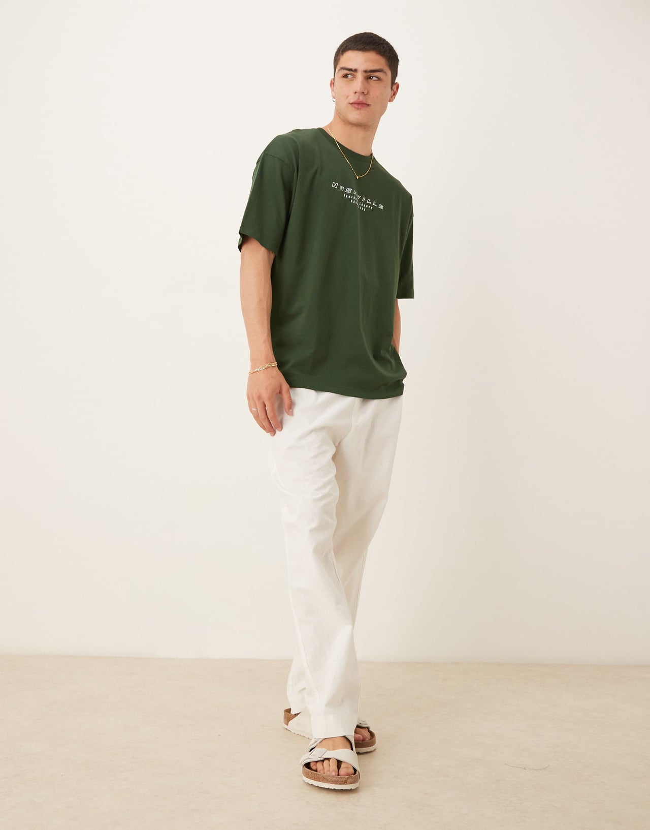 ASOS DESIGN oversized t-shirt with city graphic in dark green