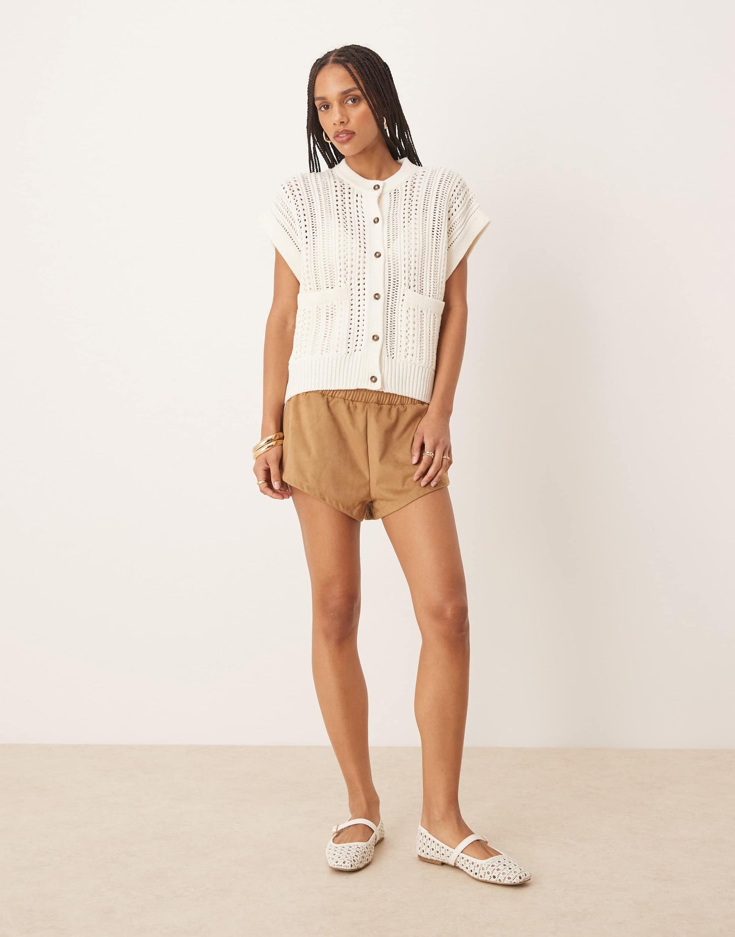 ASOS DESIGN knitted pointelle crew neck boxy waistcoat in cream