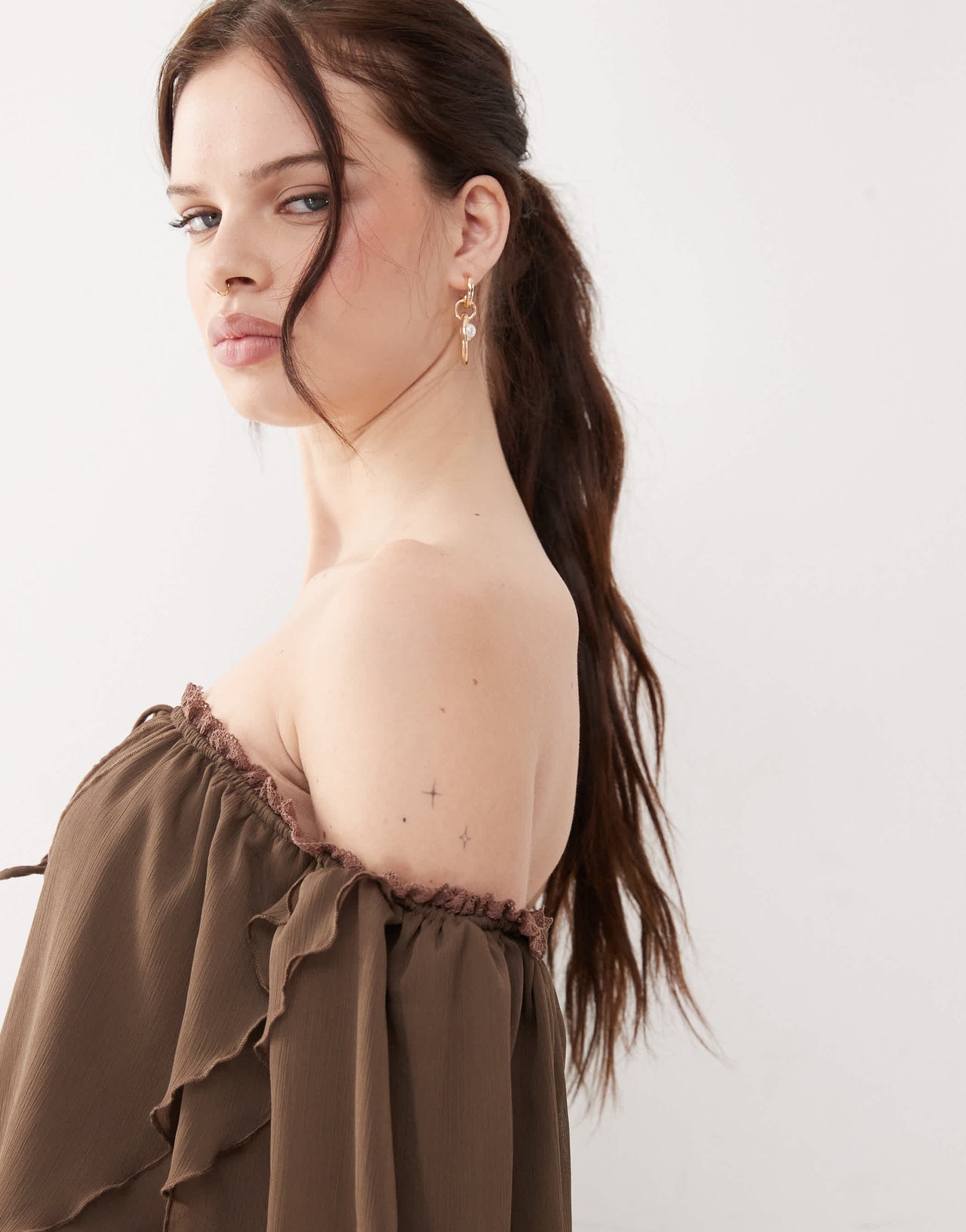 The Kript boho off shoulder ruffle top in brown