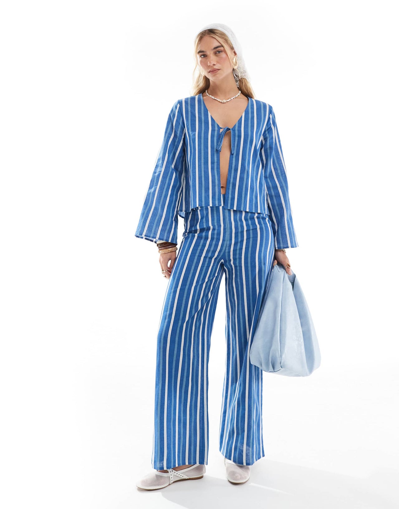 Esmee Exclusive tie front beach top with angel sleeve in blue stripe