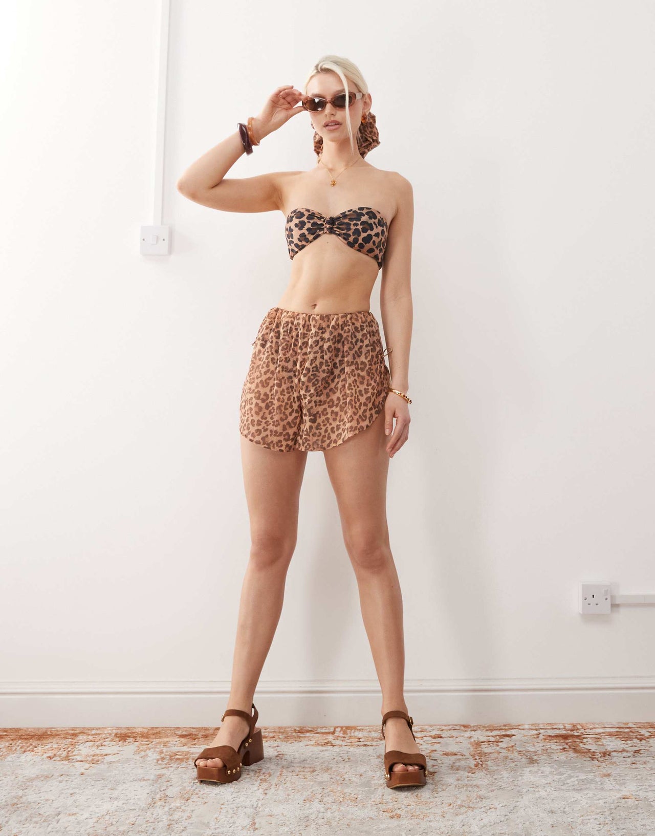 Reclaimed Vintage pull on sheer beach shorts with tie sides in leopard print co-ord