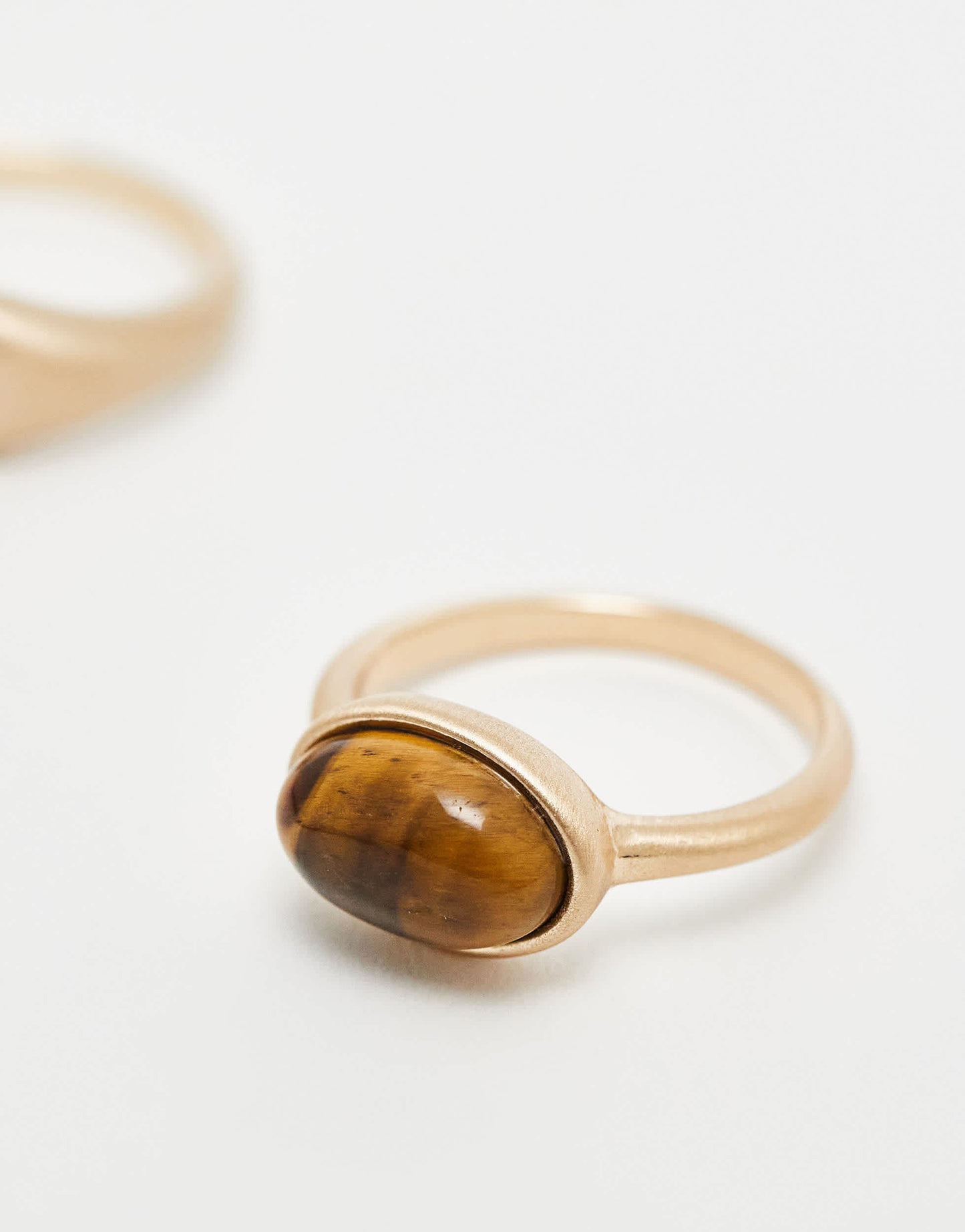 ASOS DESIGN pack of 2 stone set rings with real tigers eye in brushed gold tone