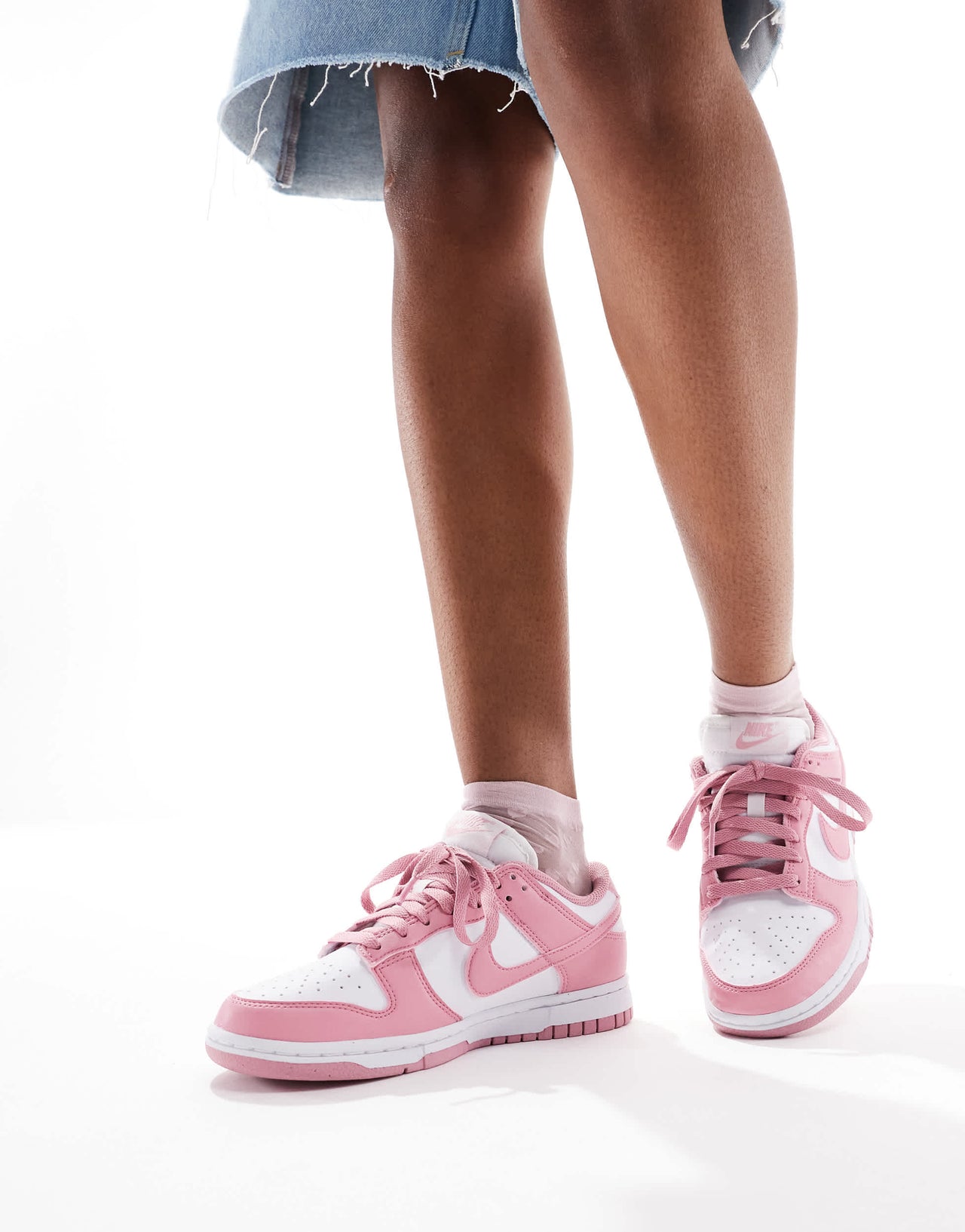 Nike Dunk Low NN trainers in white and pink