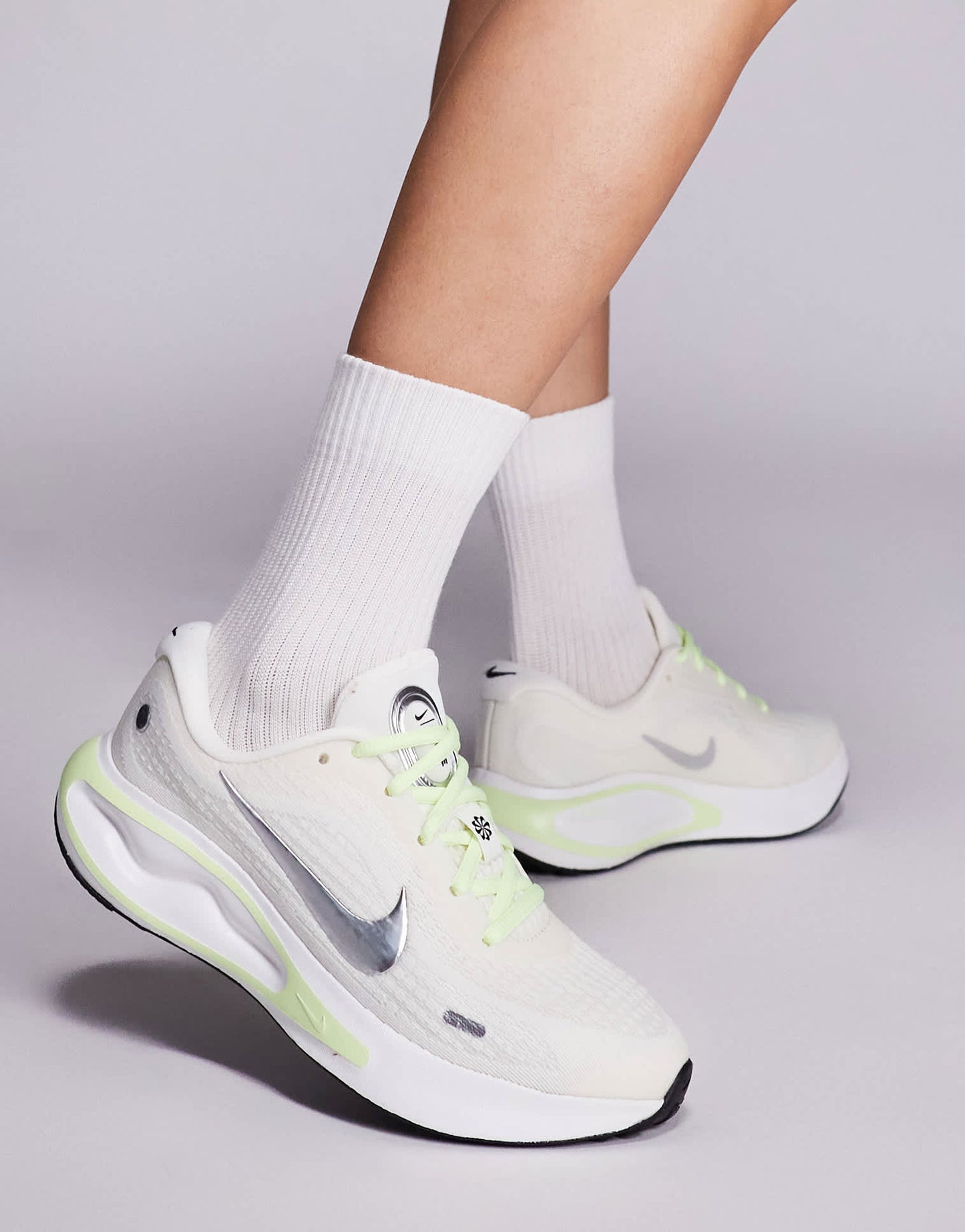 Nike Running Journey Run trainers in white and green