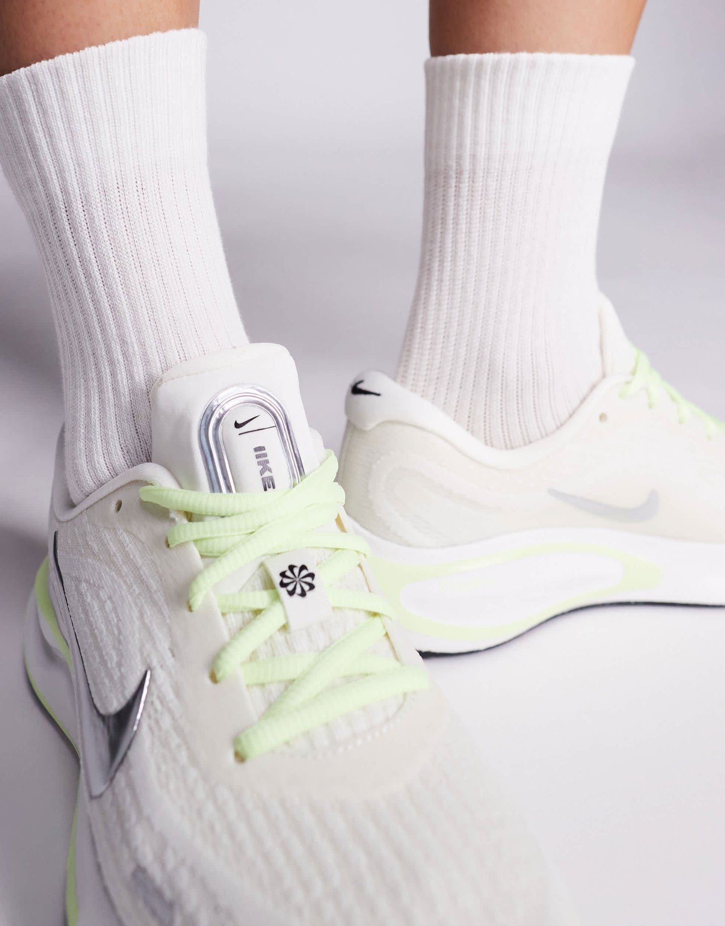 Nike Running Journey Run trainers in white and green