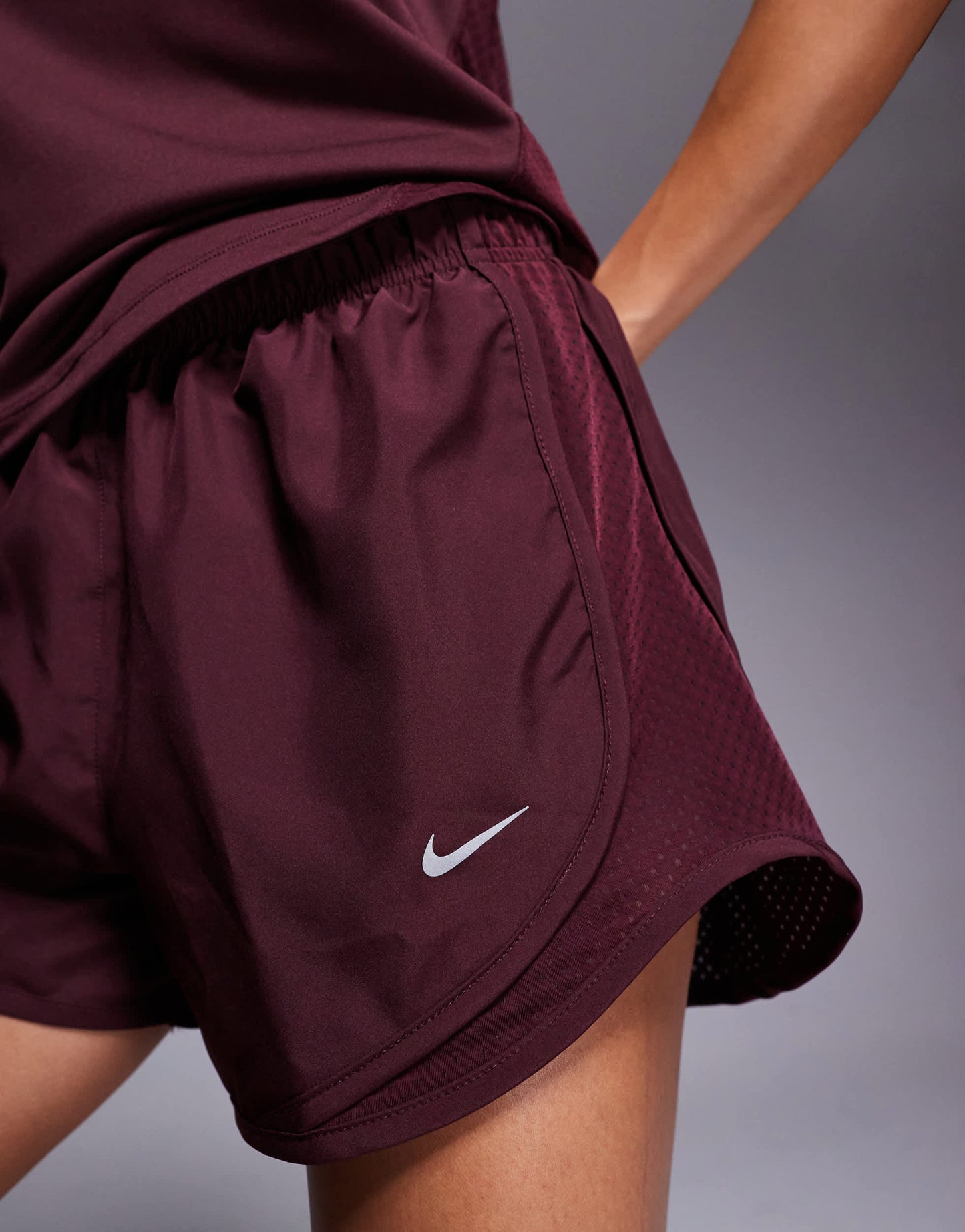 Nike Running Tempo Dri-FIT mid rise 3 inch shorts in burgundy