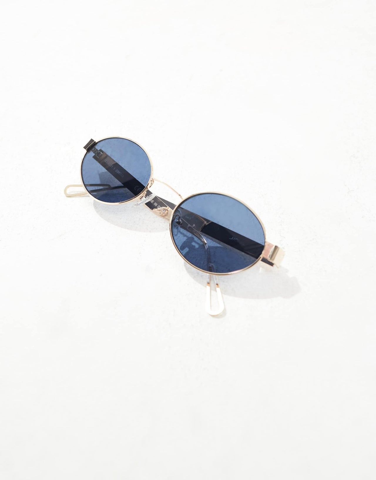 Monki metal retro oval sunglasses in gold