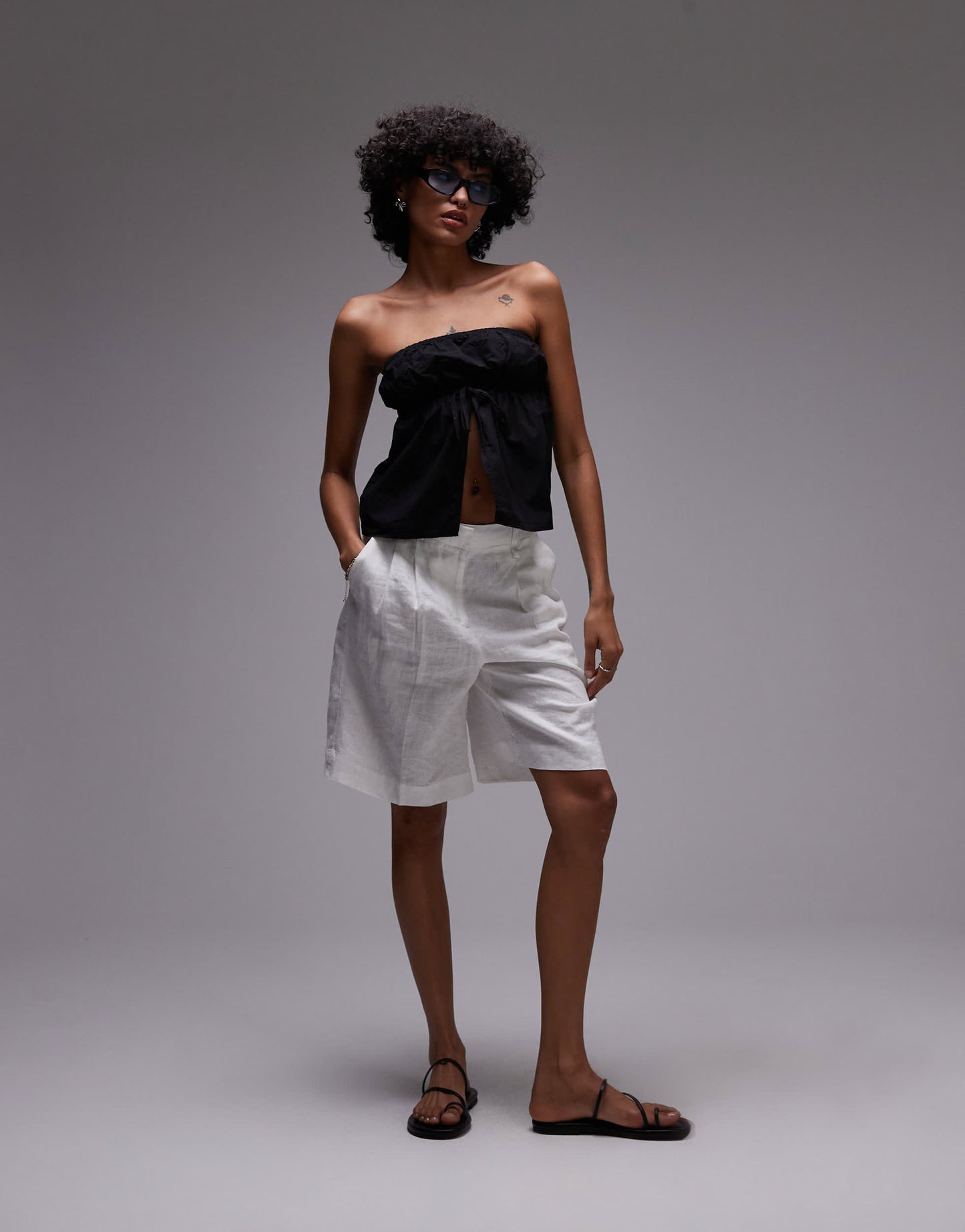 Rhythm posie gathered strapless top in black