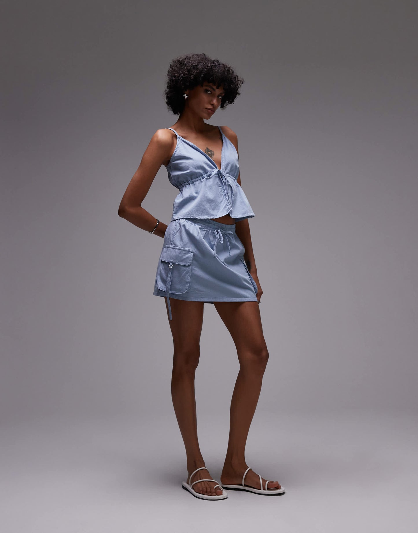 Rhythm dolly ruffle tie front top in blue