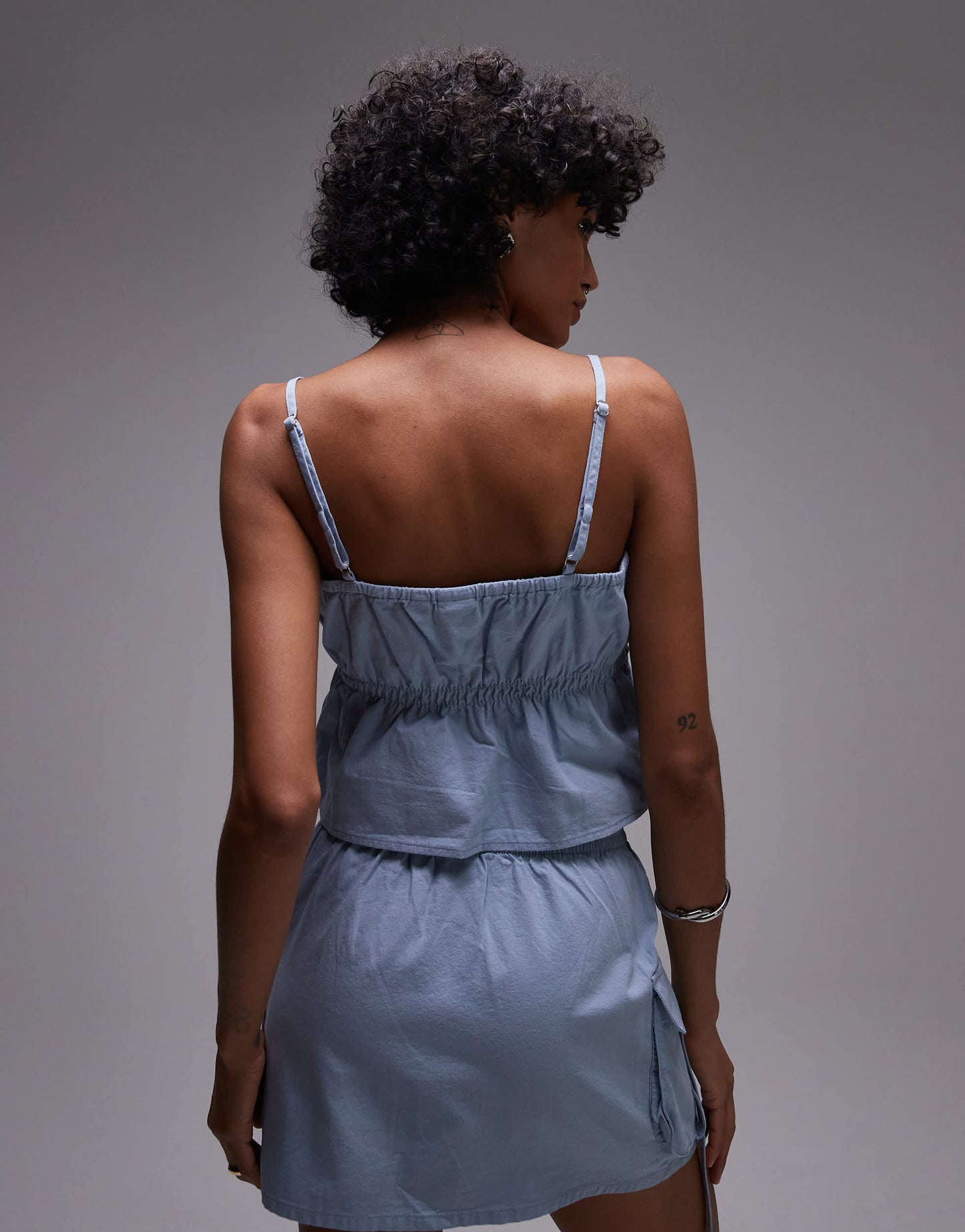 Rhythm dolly ruffle tie front top in blue